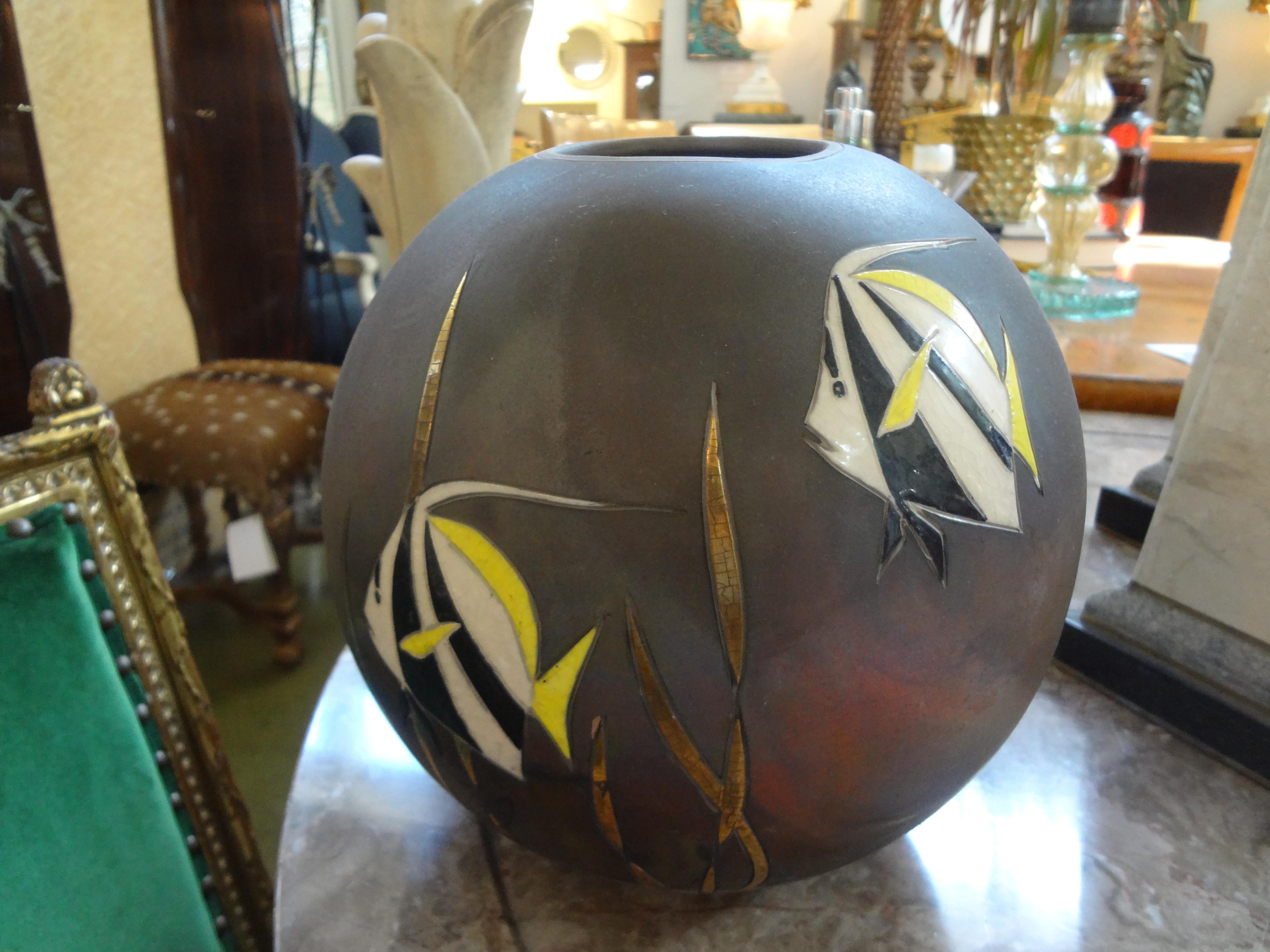Stunning vintage raku pottery vase by Tom and Nancy Giusti decorated with colorfully decorated angel fish and seaweed.