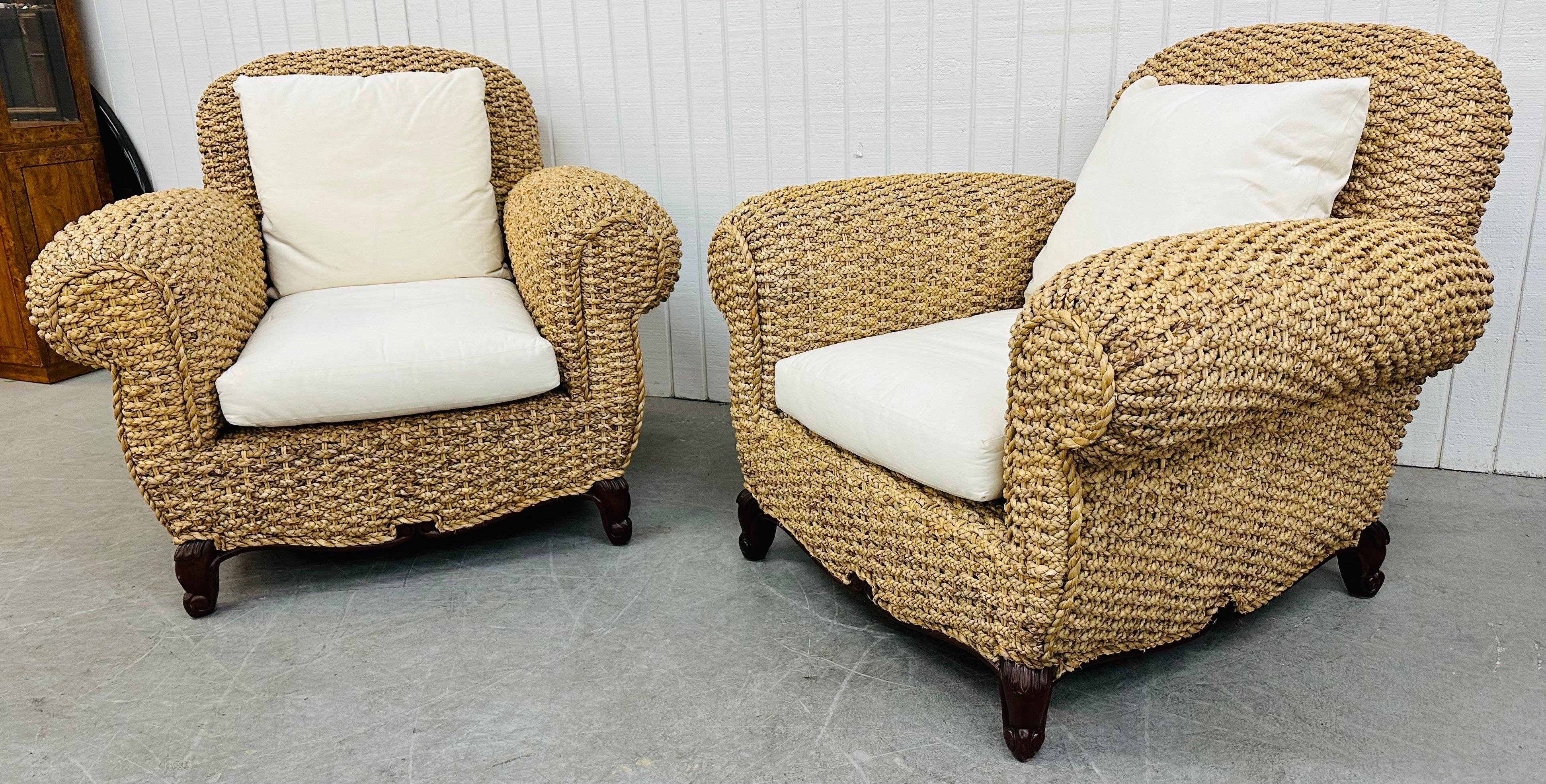 This listing is for a pair of vintage Ralph Lauren French Sisal Style Arm Chairs. Featuring a woven sisal style rope frame, french style wooden leg, white cushions, and a blue Ralph Lauren label. This is an exceptional combination of quality and