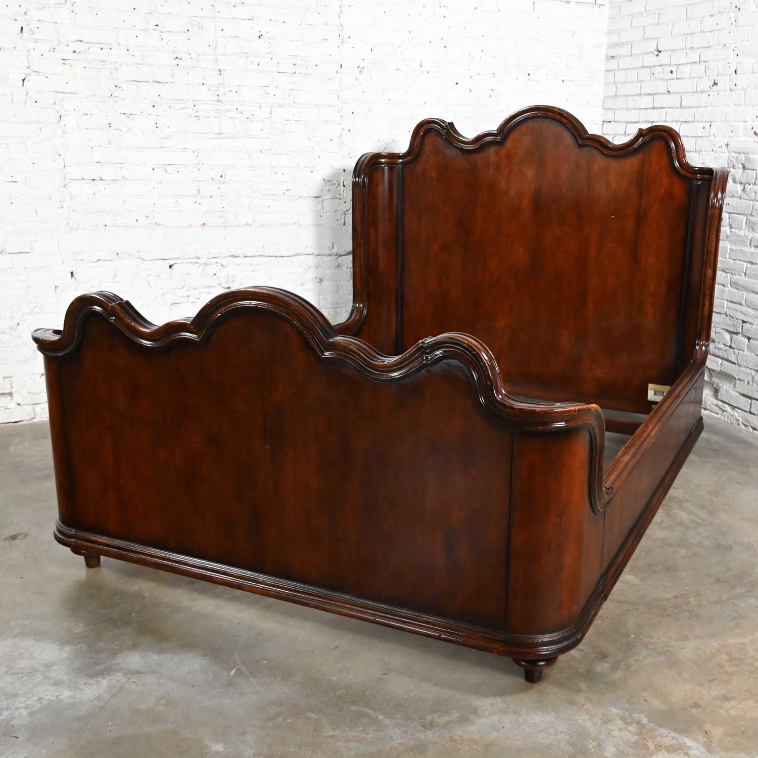 Spectacular vintage Ralph Lauren mahogany scalloped wingback sleigh queen bed with head & footboard & siderails. Beautiful condition, keeping in mind that this is vintage and not new so will have signs of use and wear. We have touched up some small