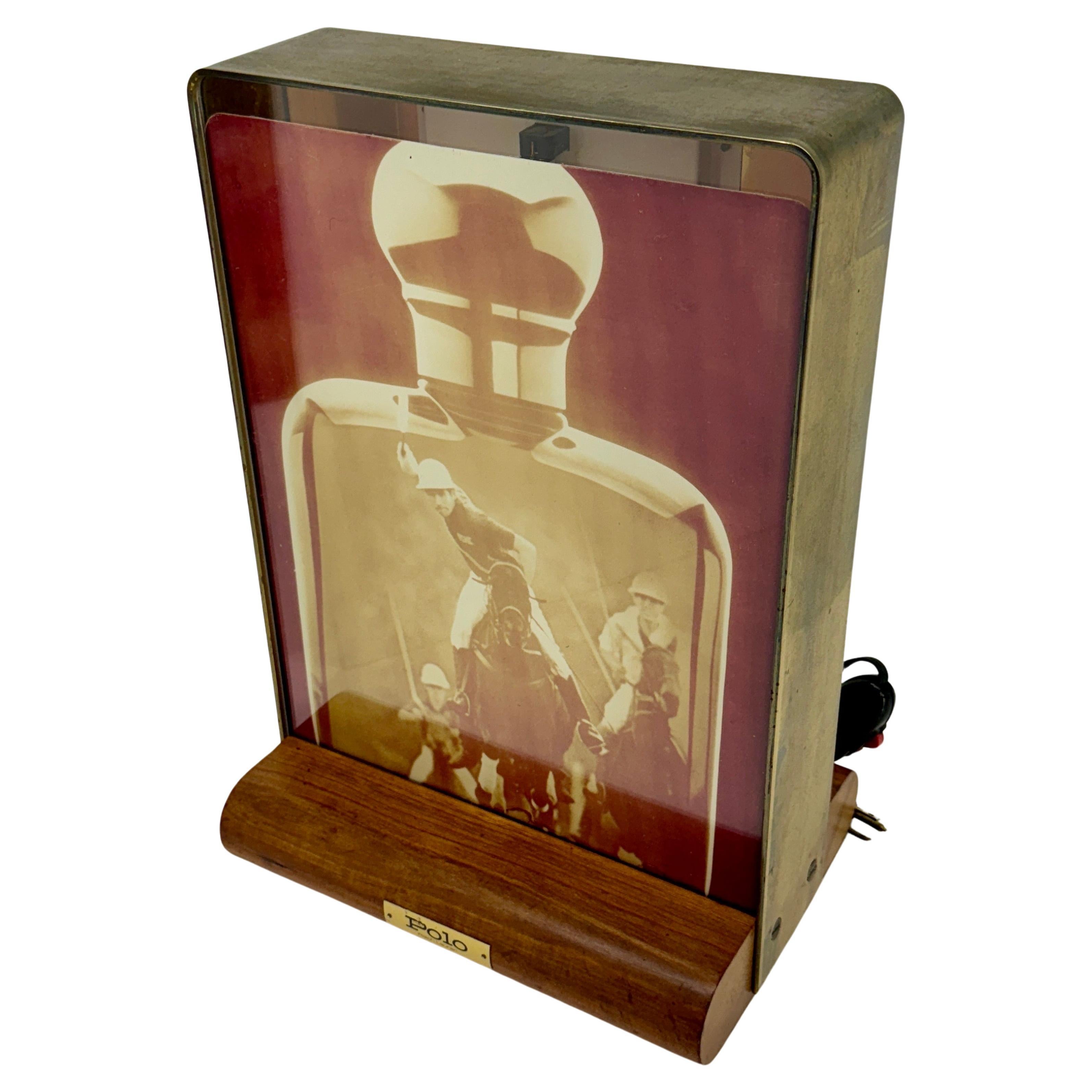 Ralph Lauren Polo Advertisement Store Display Light

Mid-Century Wooden Table Light from Ralph Lauren with Unbeatable Patina. 
This vintage Polo tabletop light makes a wonderful statement piece for the collector of this iconic brand. The working