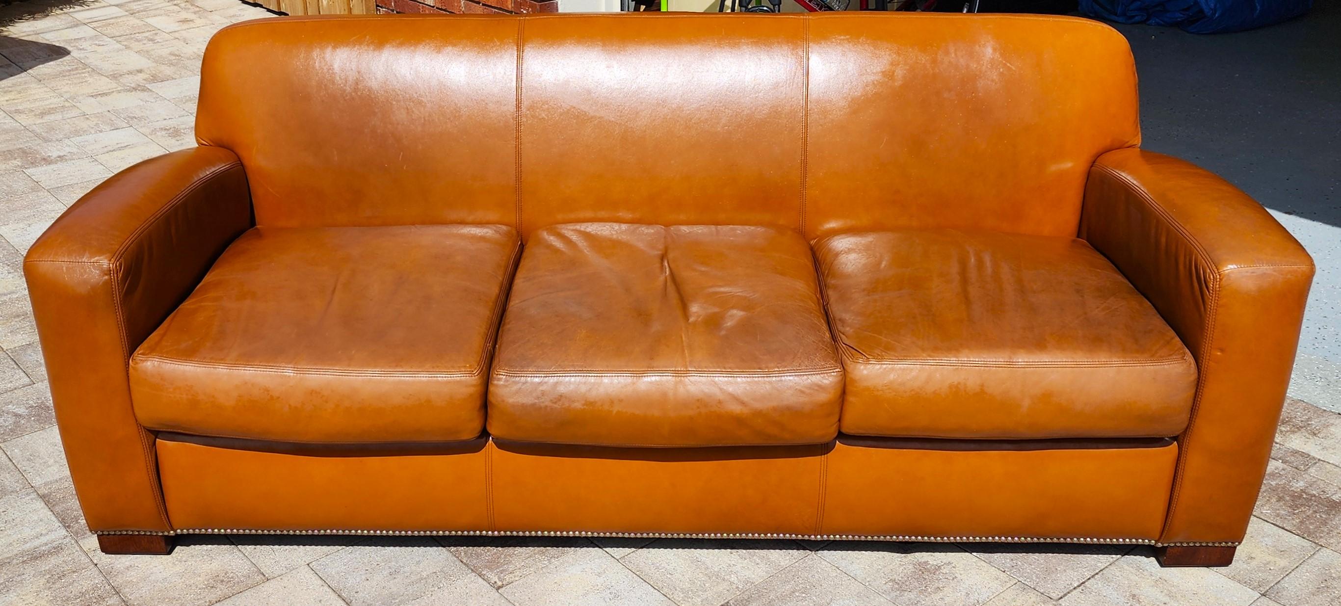 For FULL item description click on READ MORE below. 
Offering One Of Our Recent Palm Beach Estate Fine Furniture Acquisitions Of A
Vintage Ralph Lauren Saddle Leather Sofa 1980s

Approximate Measurements in Inches
32