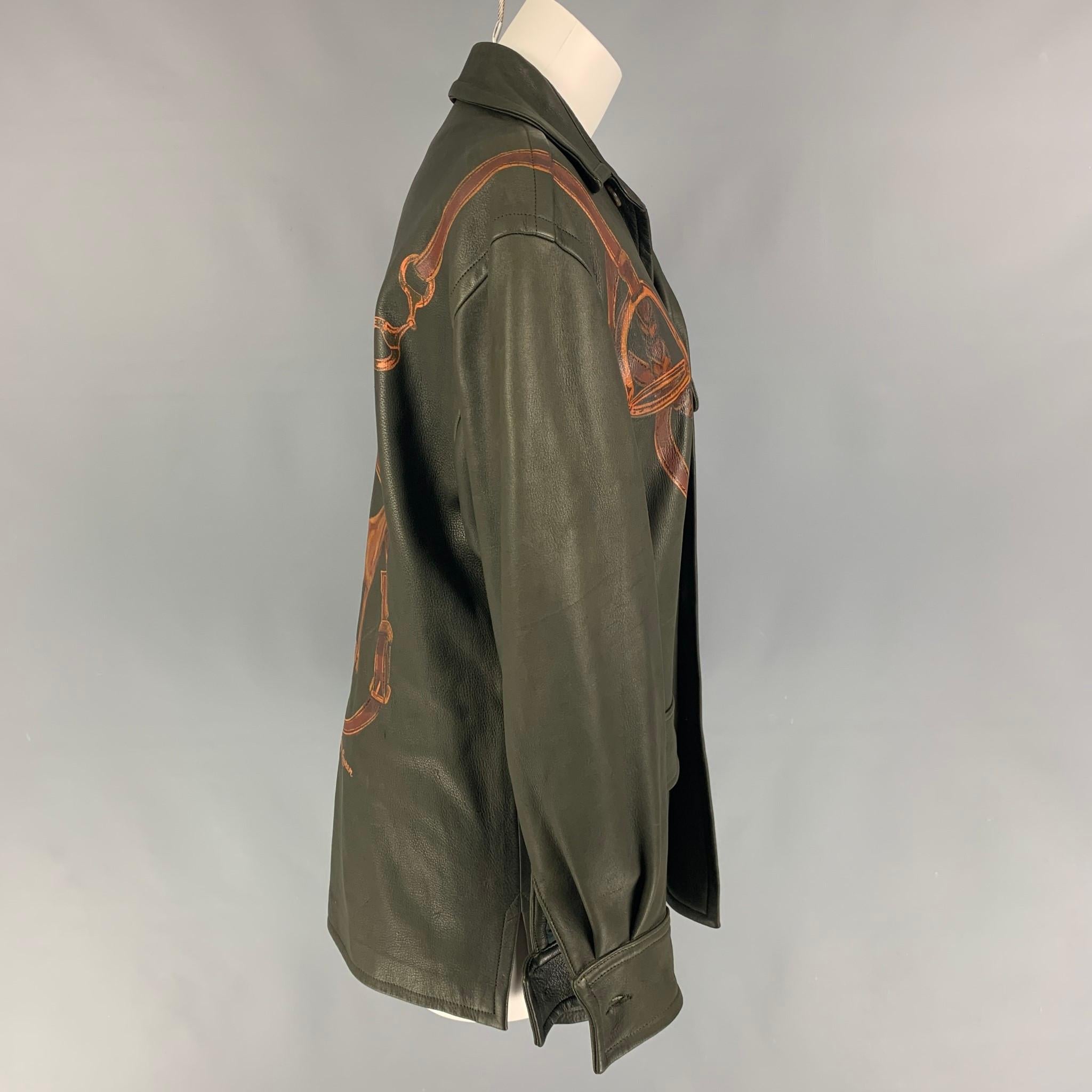 Vintage RALPH LAUREN jacket comes in a olive leather with a full liner featuring a large horse print design, flap pockets, spread collar, and a buttoned closure. 

Good Pre-Owned Condition.
Marked: 4

Measurements:

Shoulder: 20 in.
Bust: 40