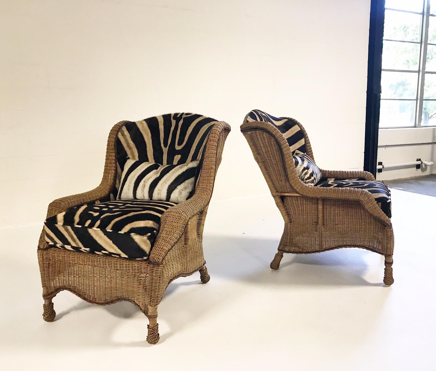 If we had a farm in Africa, at the foot of the Ngong Hills, these beautiful wingbacks would be there. The wicker is in outstanding condition. Our master upholstery team covered the back with gorgeous zebra hide. The custom zebra hide cushion is