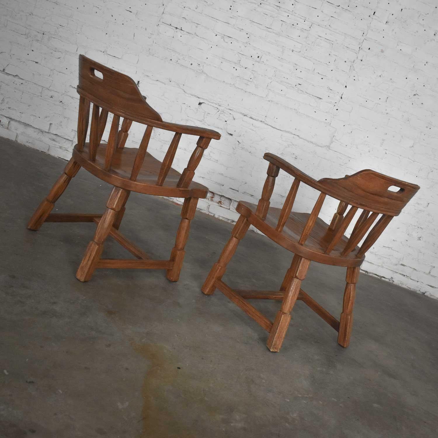 20th Century Vintage Ranch Oak Captains Armchairs by A. Brandt Acorn Brown Finish a Pair For Sale