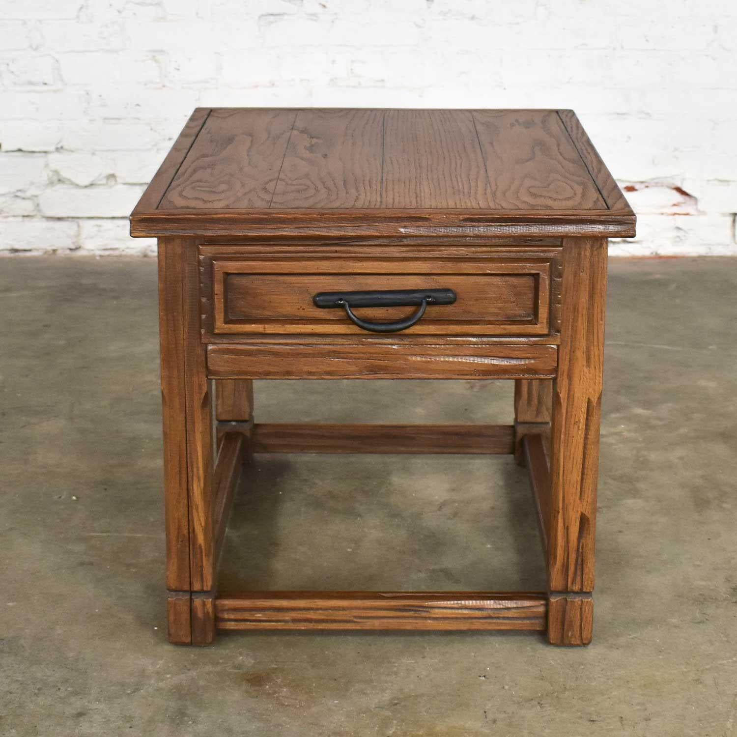 Amazing drawered end table by A. Brandt comprised of solid ranch oak with Acorn Brown finish. Wonderful vintage condition. The top has been refinished and minor repairs have been made. Also stained, polyurethane and waxed. The base is original