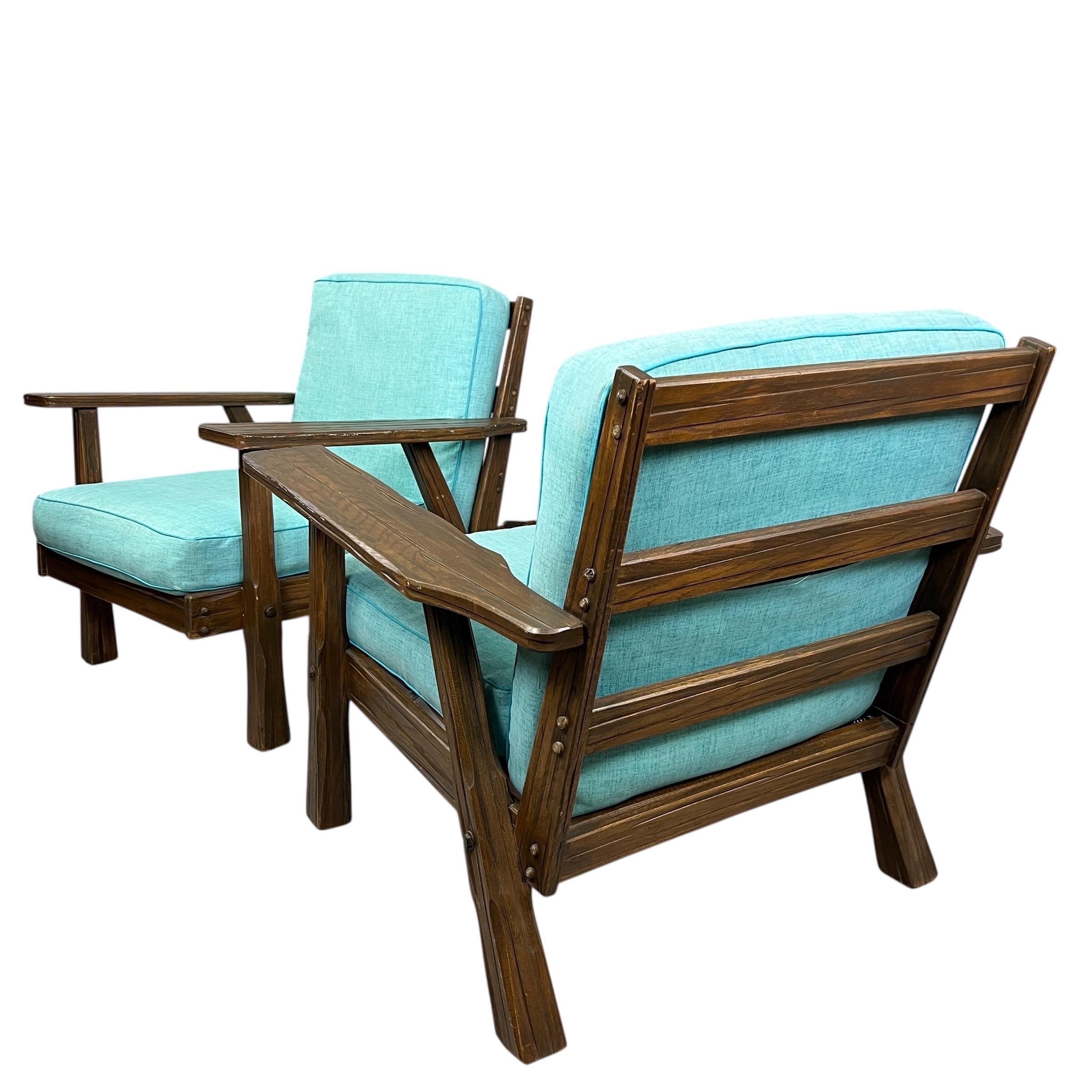 Great pair of ranch oak lounge chairs, the cushions have slip covers so the fabric can be cleaned easily