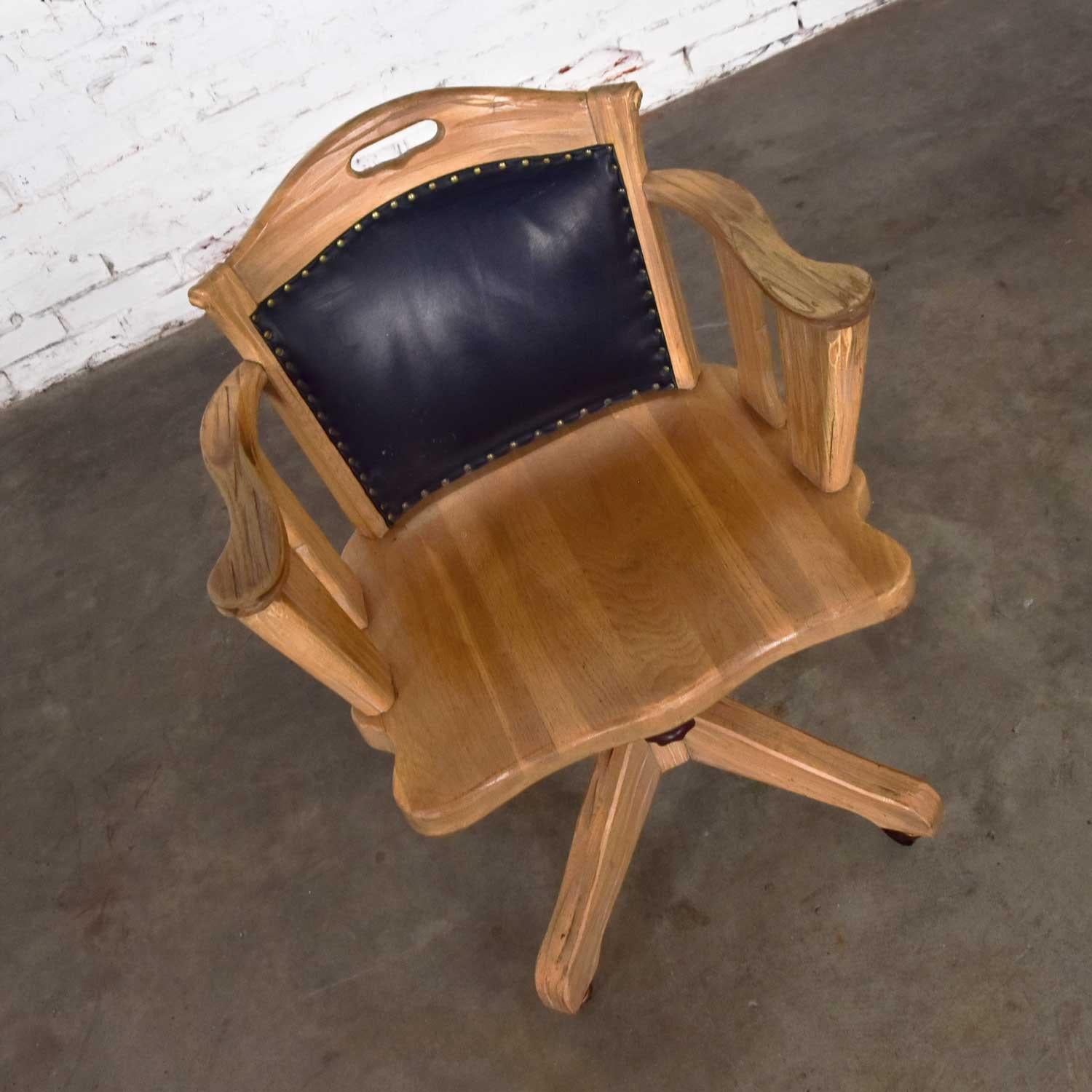 Vintage Ranch Oak Rolling Desk Chair with Leather Back by A. Brandt Company 5