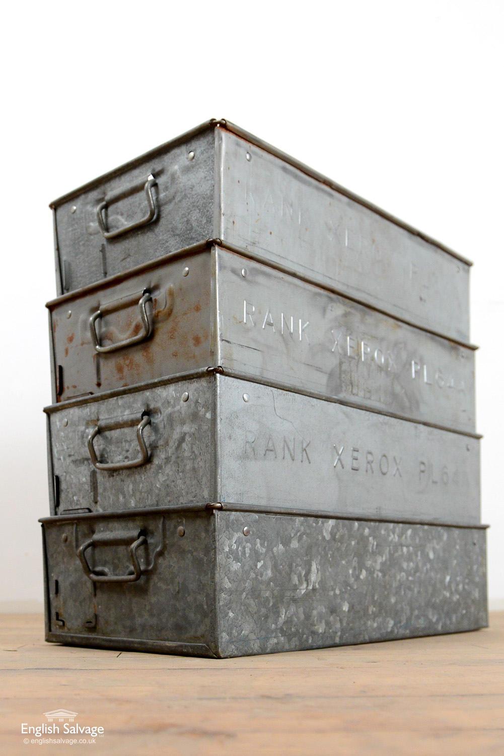 Salvaged Rank Xerox galvanized metal boxes, ideal for storage use or planters. Some scratches, dings and knocks and a small amount of surface rust. The containers are well made with reinforcements to the corners and edges and handles at either end.