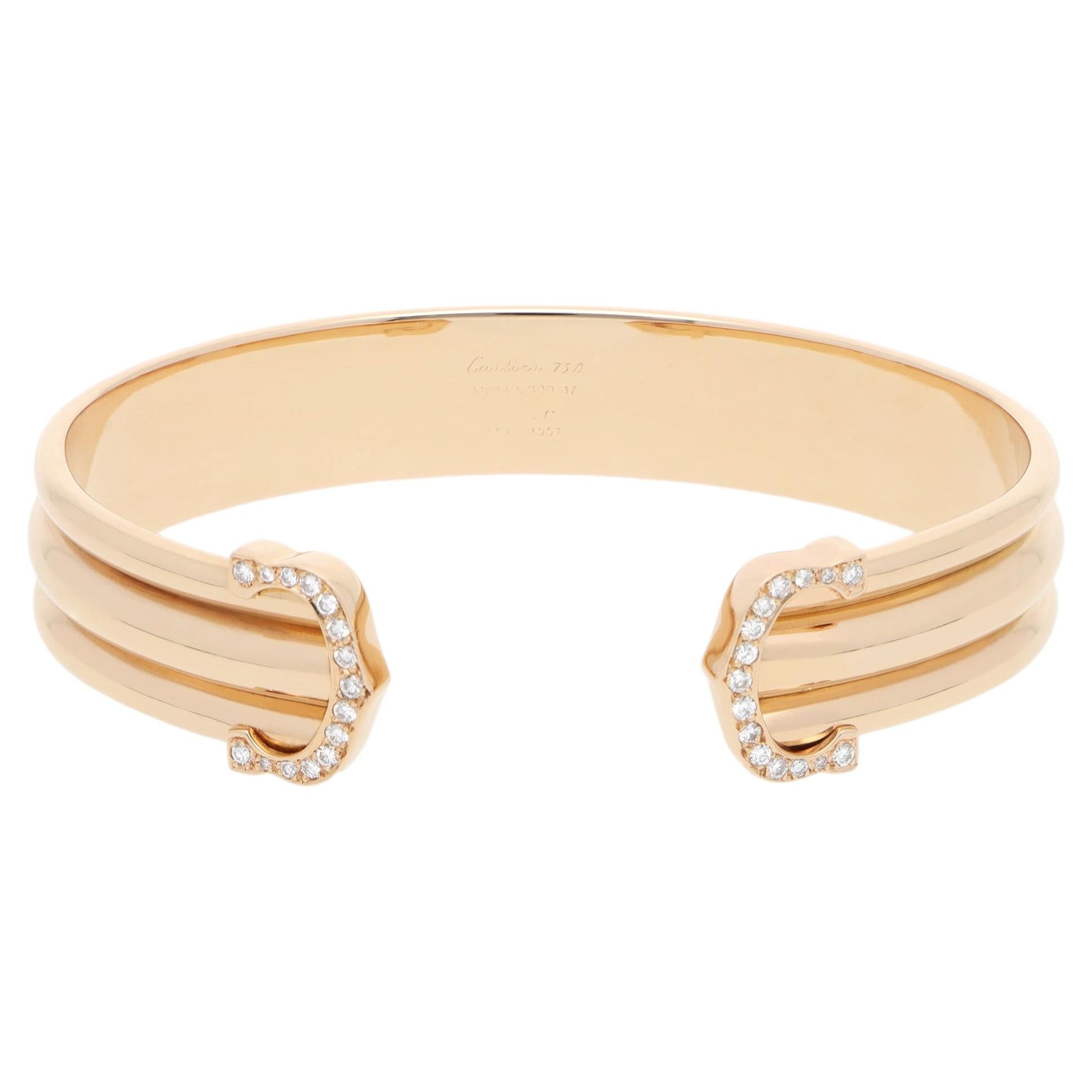 Bracelet vintage rare « Double C » de Cartier de 1997, ouvert et serti de diamants, en or rose