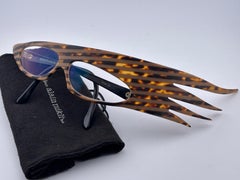 Vintage Rare Alain Mikli " Plume " Tartaruga Occhiali da sole con montatura reattiva ai raggi UV 1988