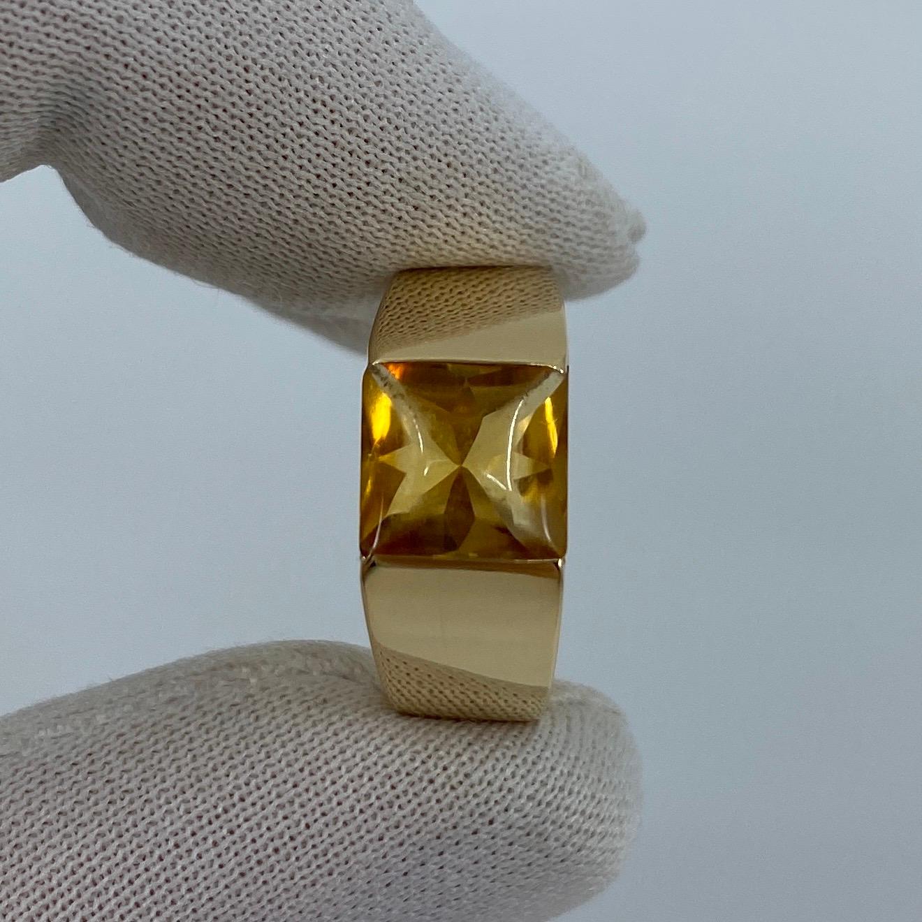 Cartier Vivid Yellow Citrine 18k Yellow Gold Tank Ring.

Stunning yellow gold ring with an 8mm tension set vivid yellow citrine. Fine jewellery houses like Cartier only use the finest of gemstones and this citrine is no exception. A top grade