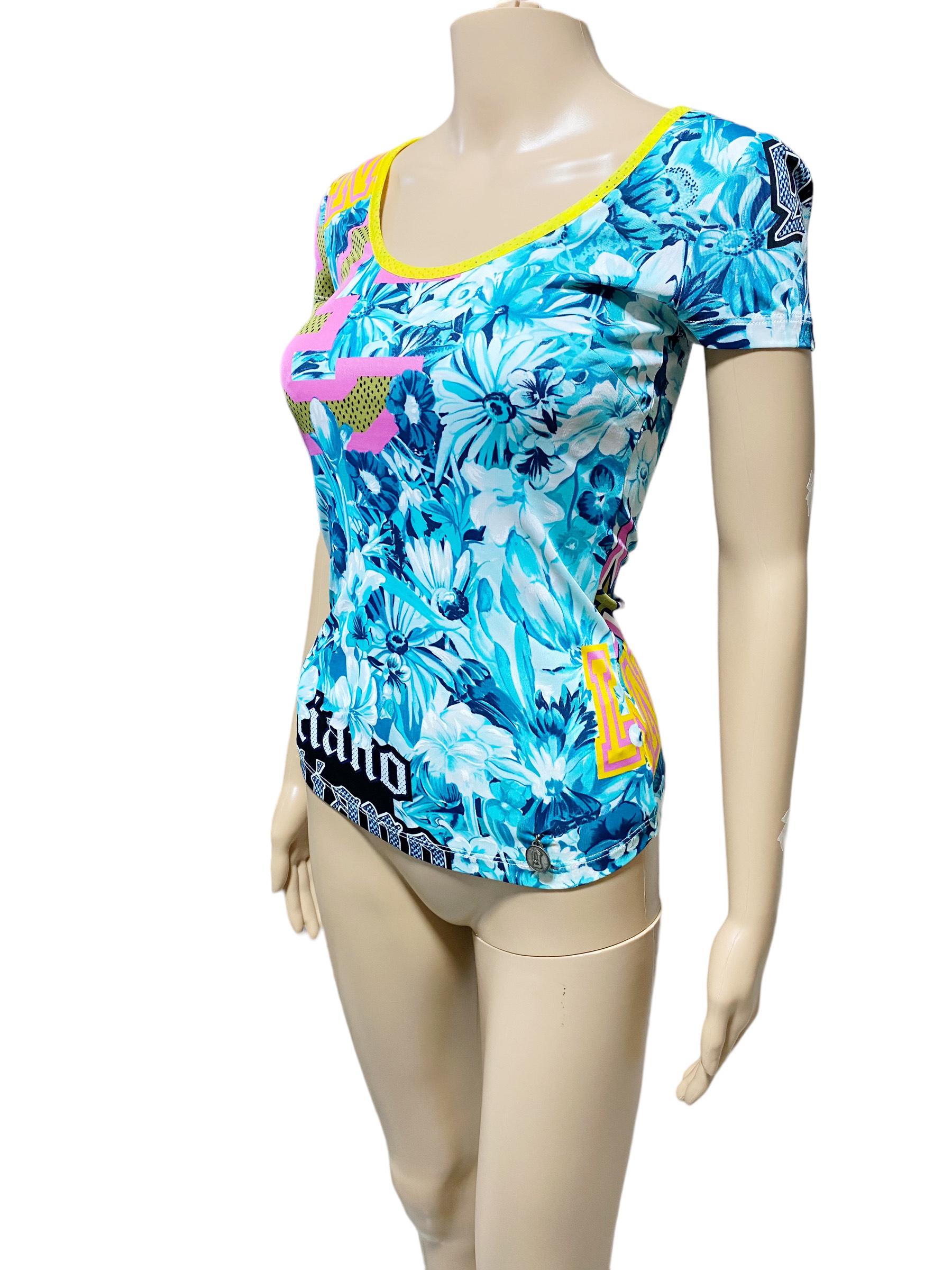 Vintage John Galliano athleisure style with floral print & the words Los Angeles, Galliano and football jersey style numbers on an aqua and turquoise floral print and brightly colored accents. 

Designer: John Galliano
Dimensions (Taken