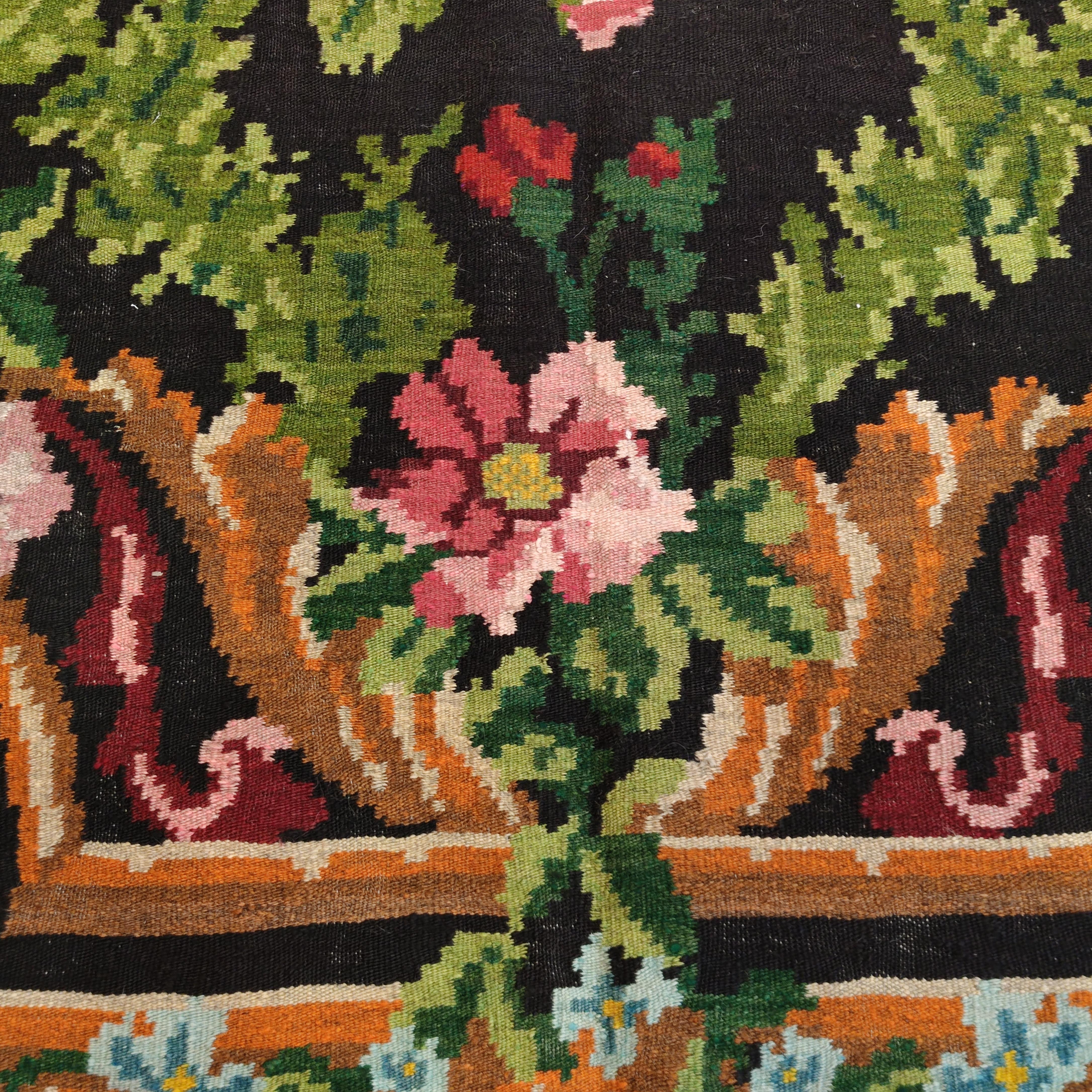 Wool Vintage Rare Room Size Black Ground Bessarabian Kilim with Botanical Pattern For Sale