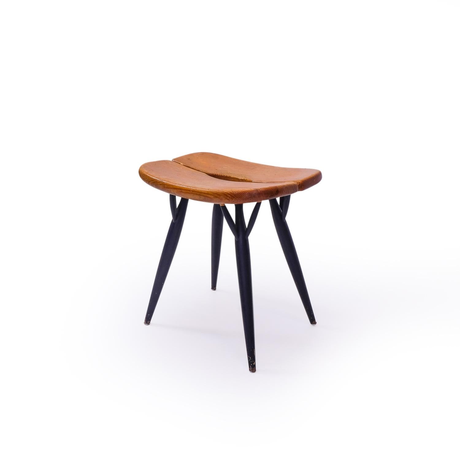 Early Pirrka Series Stool in pine produced by Asko, Finland. This rare piece was designed as a lower version of the regular height Pirrka stool.

Ilmari Tapiovaara (1914) was a Finnish interior and design furniture, during his long career that