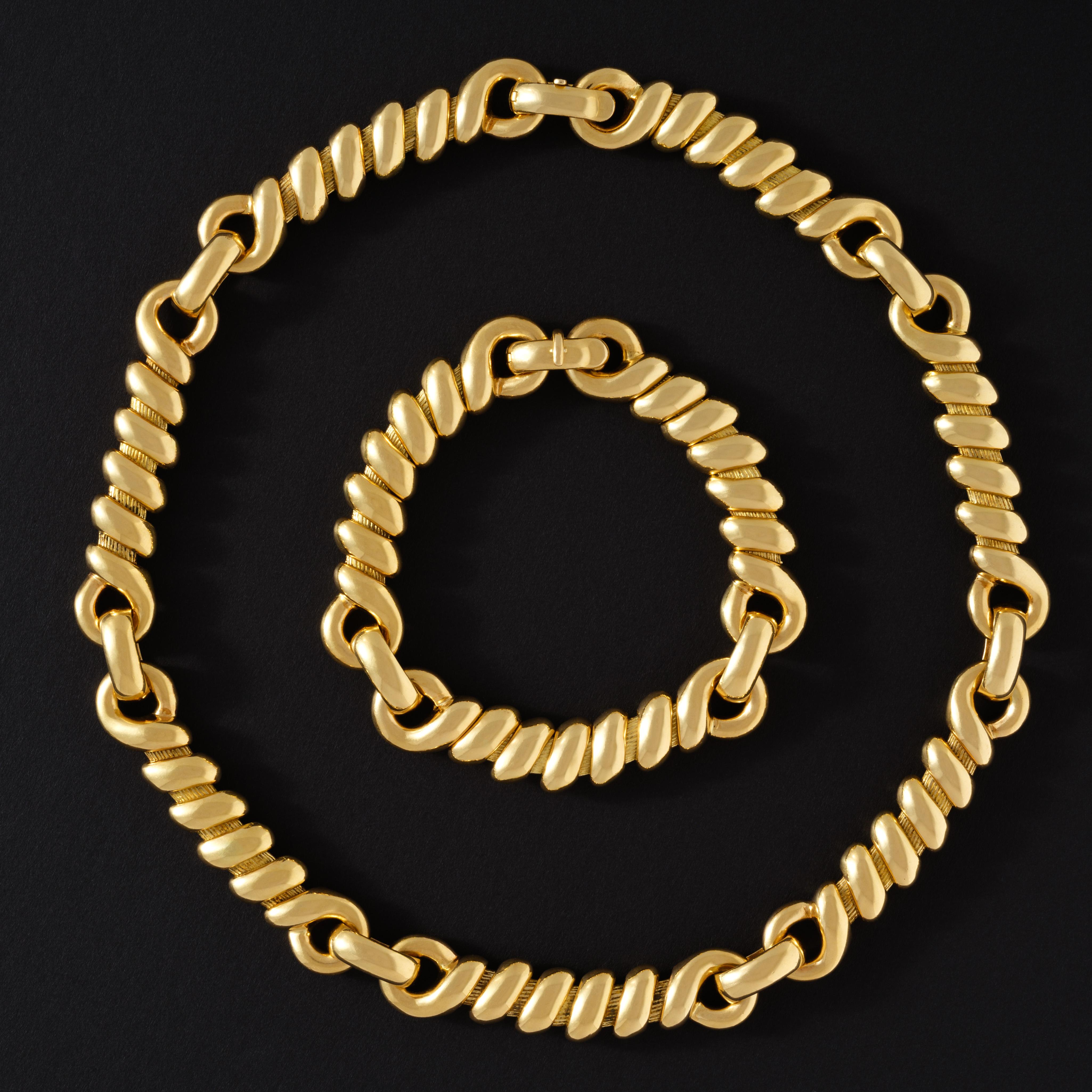 Georges Lenfant Set di collane e bracciali convertibili 
c. 1960s
Oro giallo 18 carati, costruzione chaîne d'ancre con intreccio a corda, chiusure a scomparsa  
Estremamente raro

collana più lunga insieme al braccialetto: 26,5 pollici
Lunghezza
