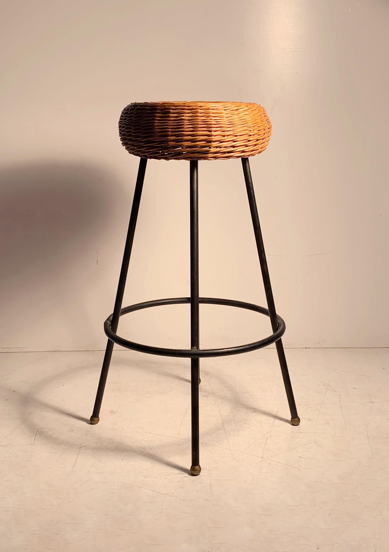 Beautiful example of a Tony Paul stool with cane seat. Very nice vintage condition. style of Salterini