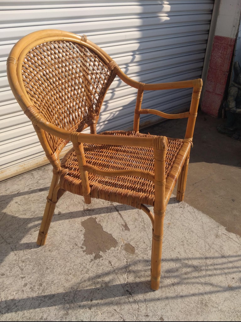 Poltrona boho chic vintage in rattan e bambù con cuscino in