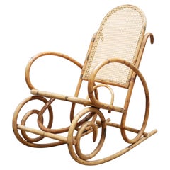 Vintage rattan and cane rocking chair