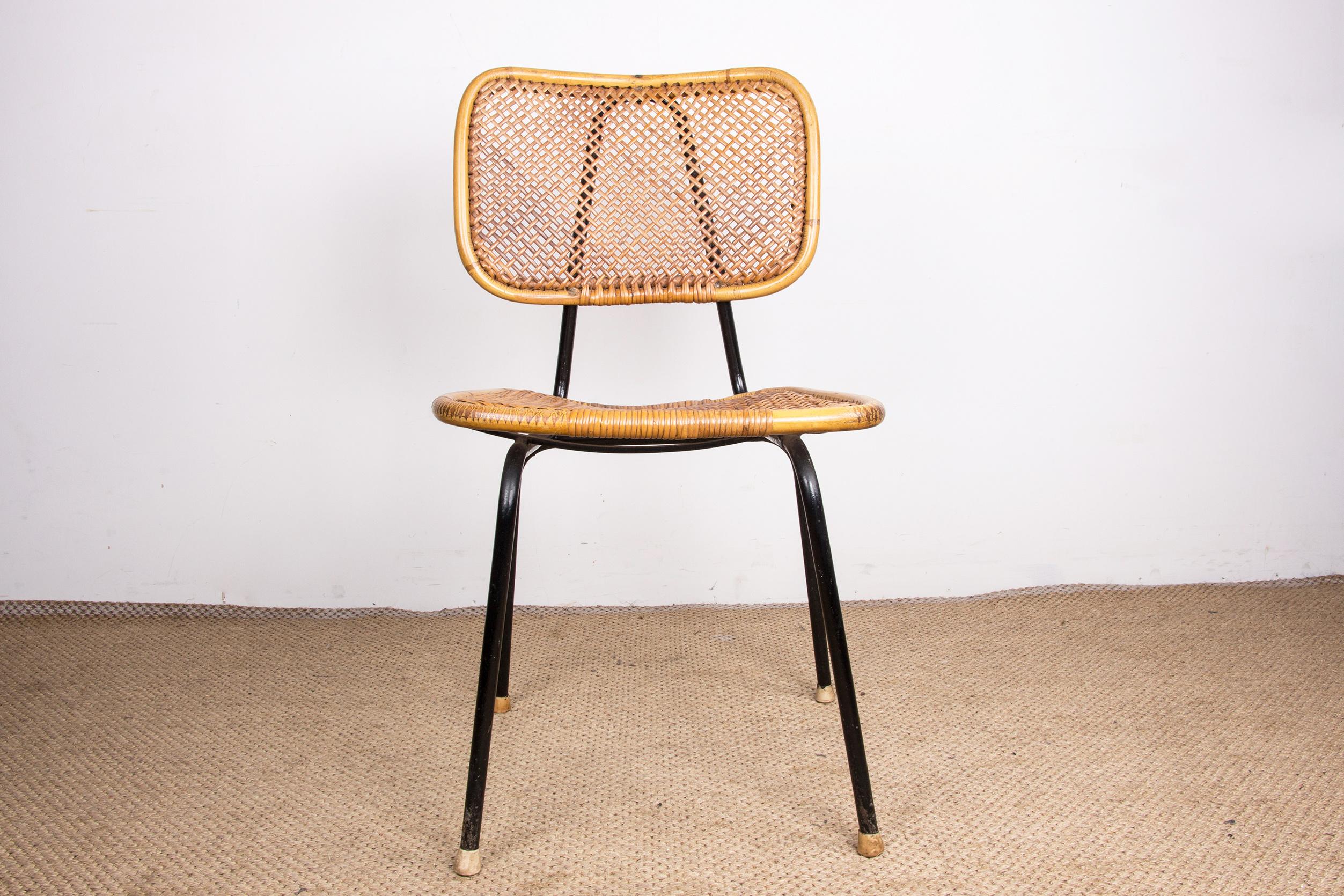 Superb vintage chair with a very elegant design. Black metal frame, rattan back and seat.
