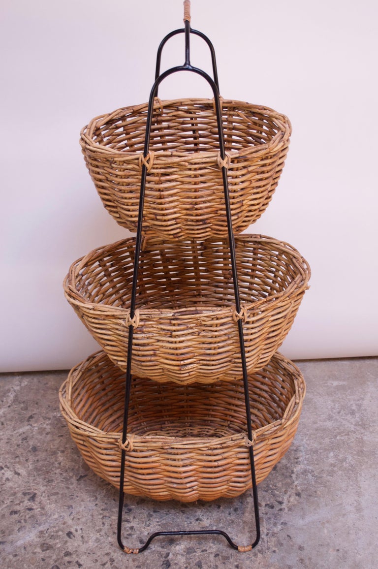 three wicker basket stand