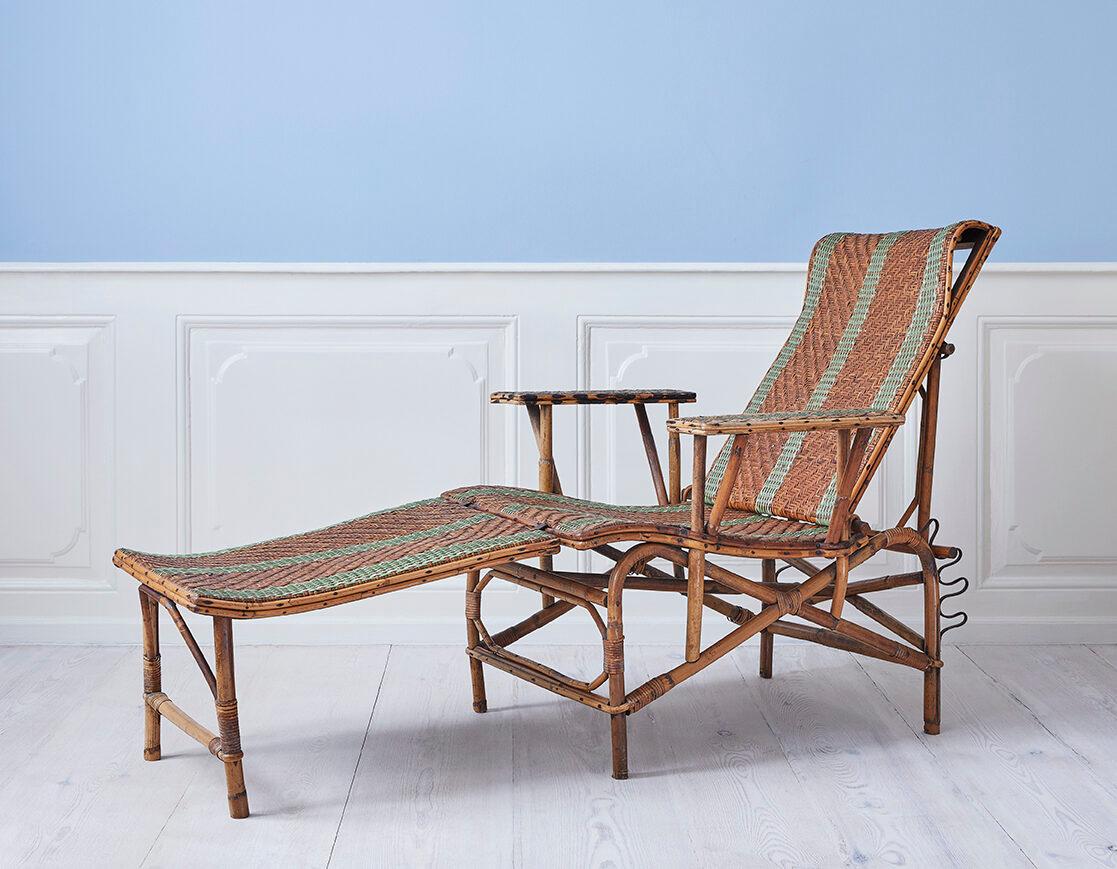 France, 1920s

Adjustable rattan armchair and footrest with green woven details.

Measures: H 90 x W 76 x D 170 cm.