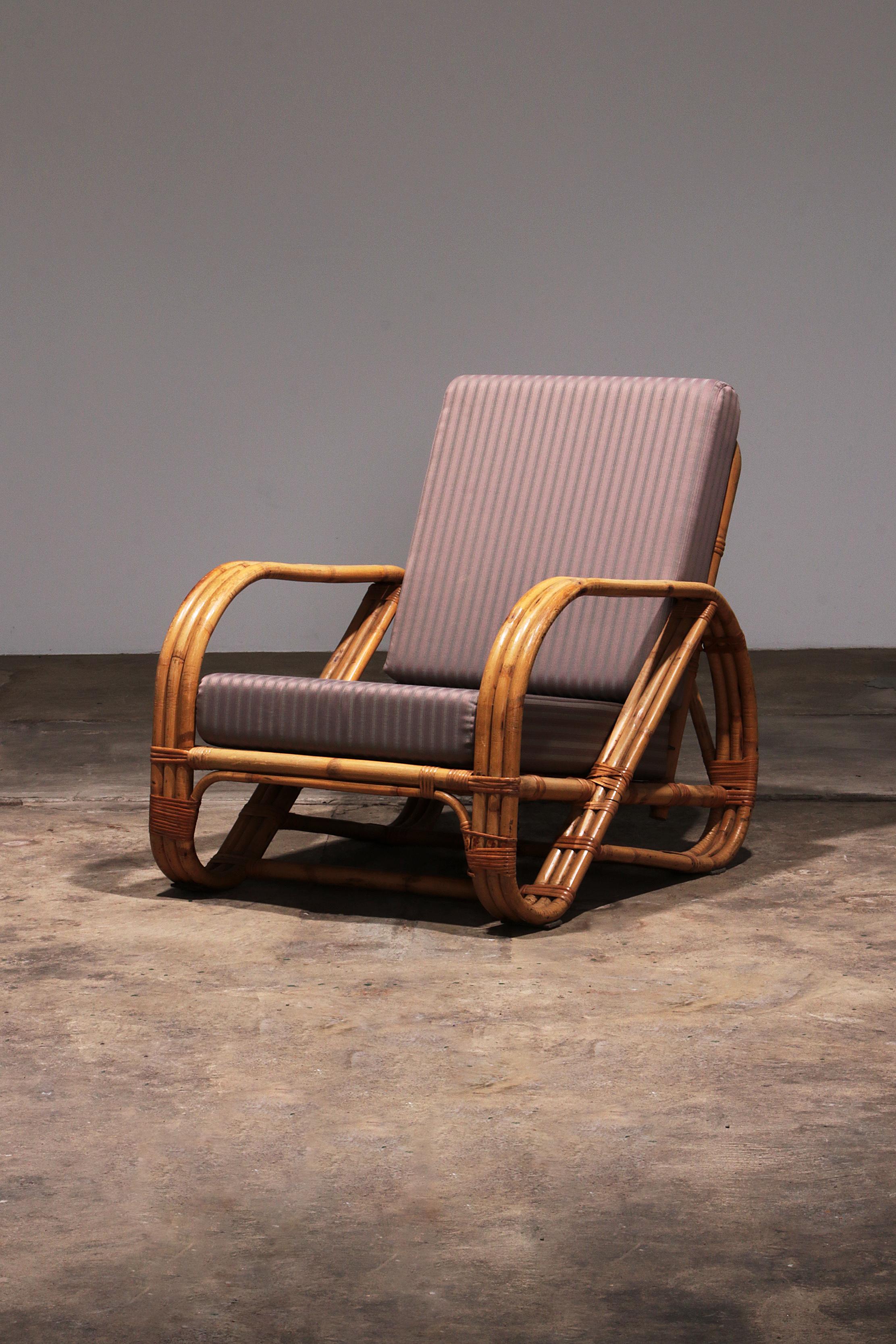 Vintage Rattan Bamboo Lounge Chair - Style Paul Frankl 1960

Do you also dream of sultry evenings under a tree, cozy in a bohemian atmosphere with a glass of wine in your hand? Then we have the perfect chair for you. Our vintage rattan bamboo lounge