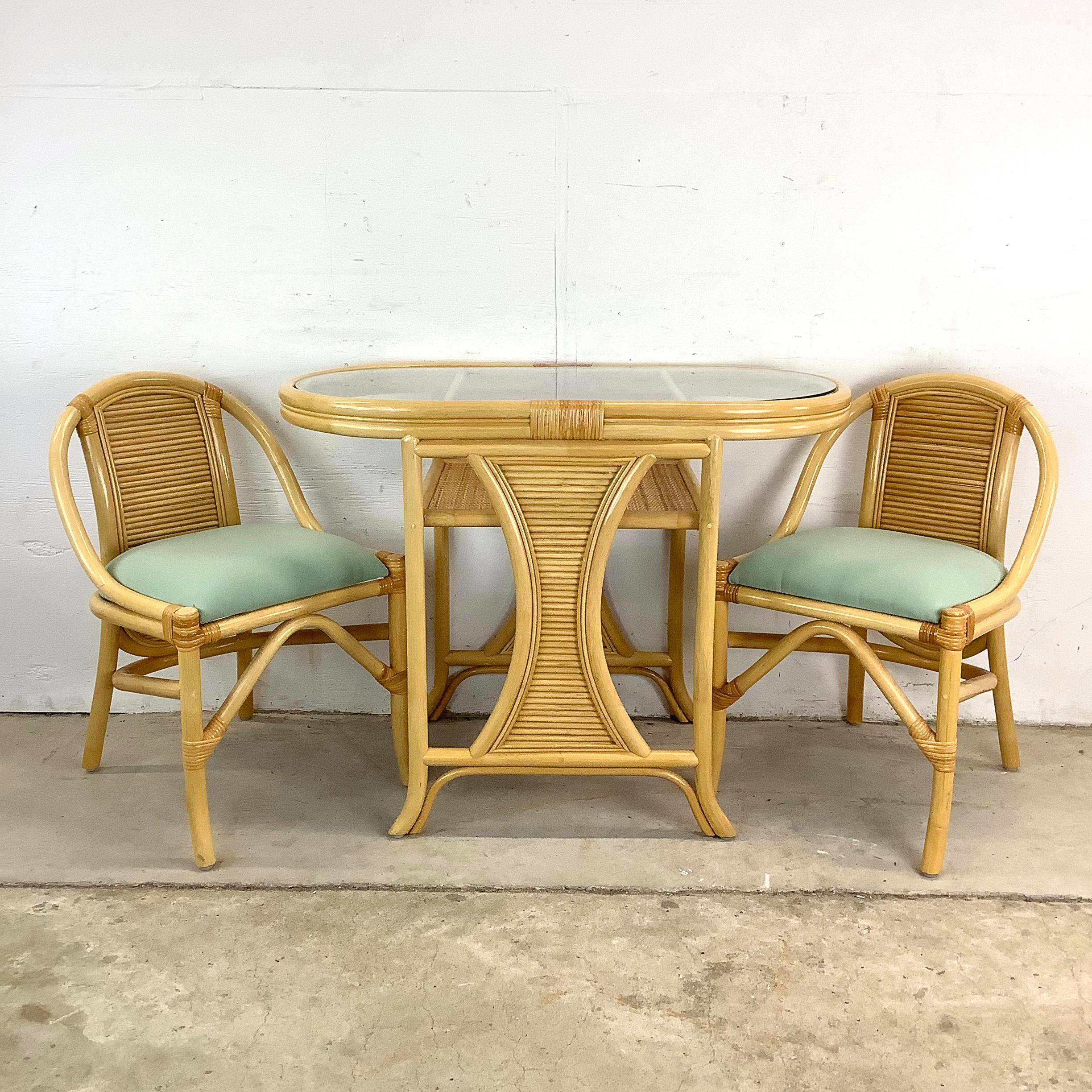 Elevate your breakfast routine with this vintage bamboo nesting table set, crafted in a charming coastal rattan style that brings a breezy, casual elegance to your sunroom or compact kitchen. The set includes a petite rectangular table and two