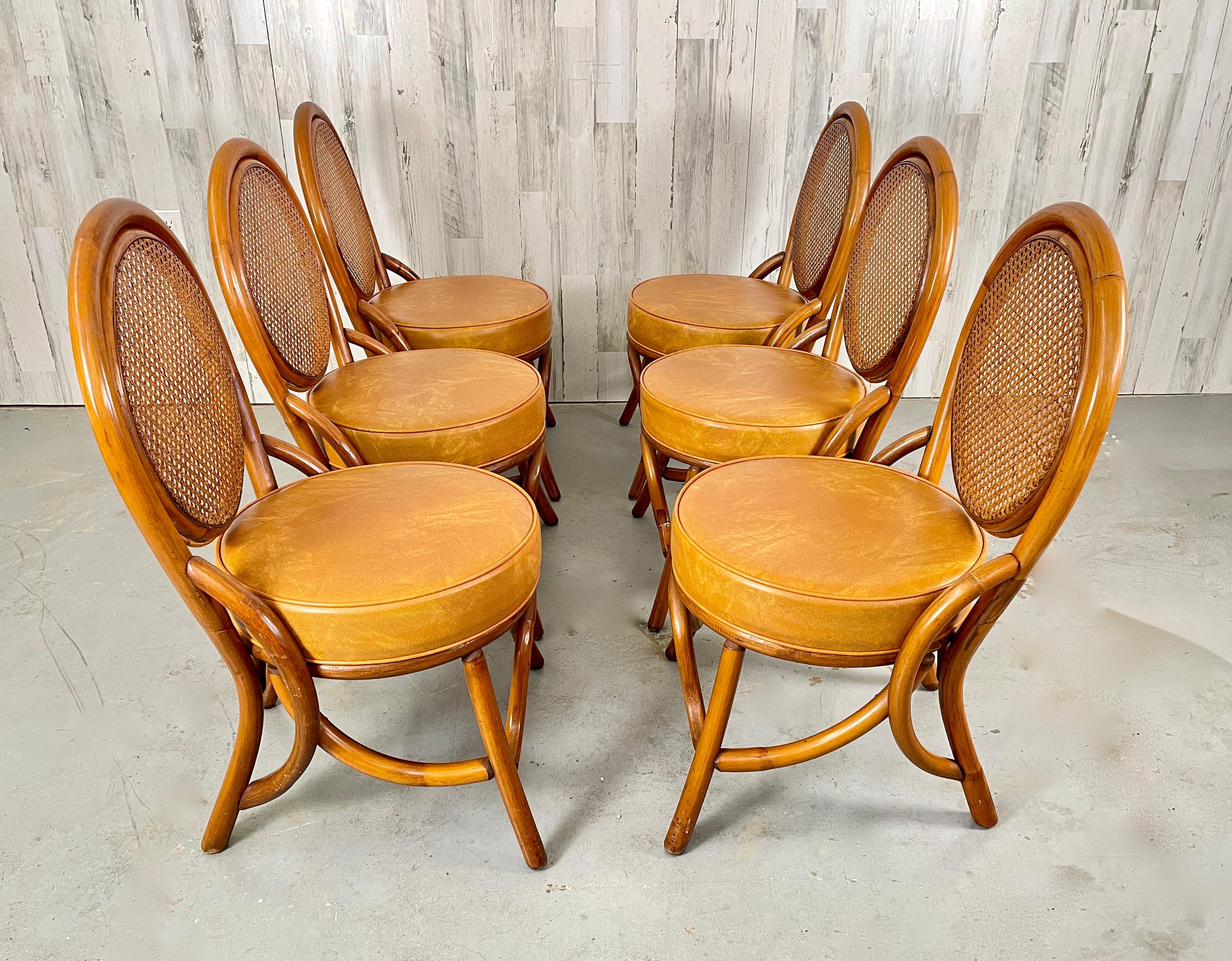 Vintage Rattan & Cane Back Dining Chairs In Good Condition In Denton, TX