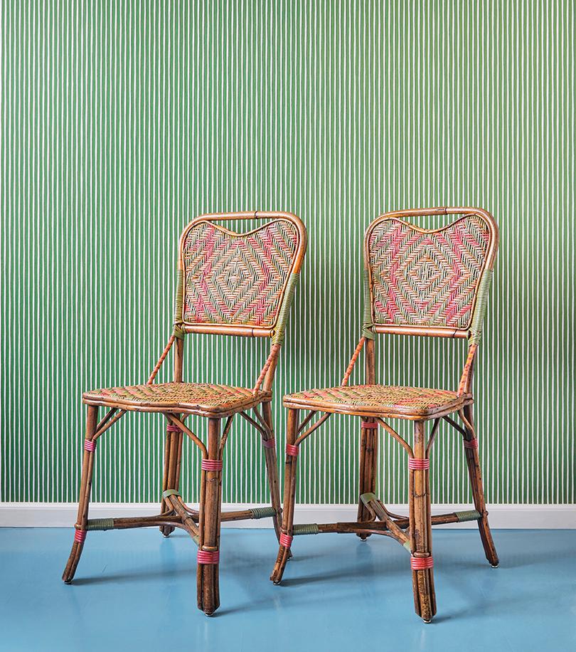 France, 1930s

A pair of rattan chairs with elegant woven details in green and coral.

Measures: H 91 x W 40 x D 46 cm.