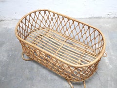 Vintage rattan cradle