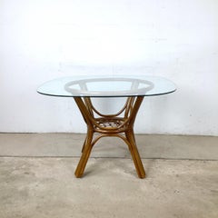 Vintage Rattan Dining Table, Sculptural Swept-Leg Base