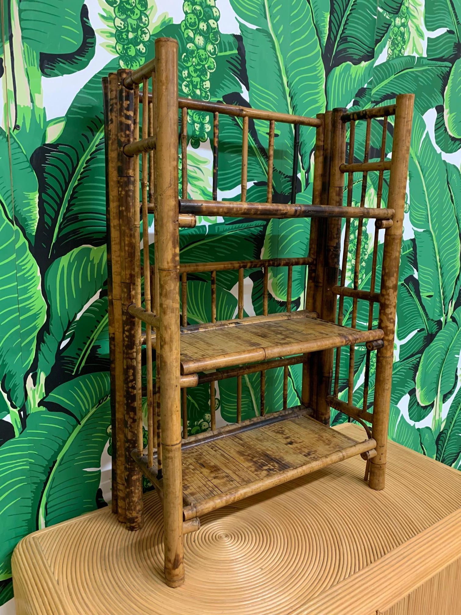 Vintage rattan and bamboo folding shelf mounts to the wall or can be used free standing. Very good condition with minor imperfections consistent with age.