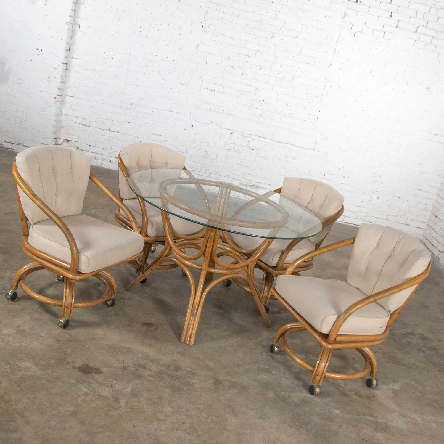 Vintage Rattan Game Table Set Round Glass Top Table and 4 Swivel Rolling Chairs In Good Condition In Topeka, KS