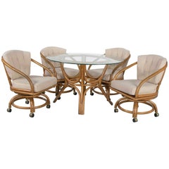 Retro Rattan Game Table Set Round Glass Top Table and 4 Swivel Rolling Chairs
