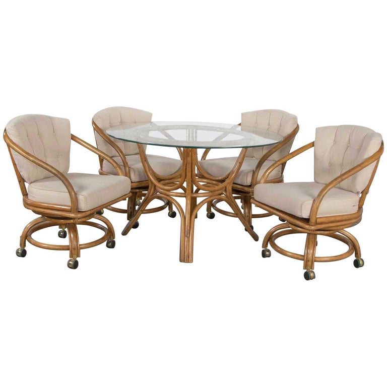 Vintage Rattan Game Table Set Round Glass Top Table and 4 Swivel Rolling  Chairs at 1stDibs | round wicker table with glass top and 4 chairs, vintage  game table and chairs, rattan