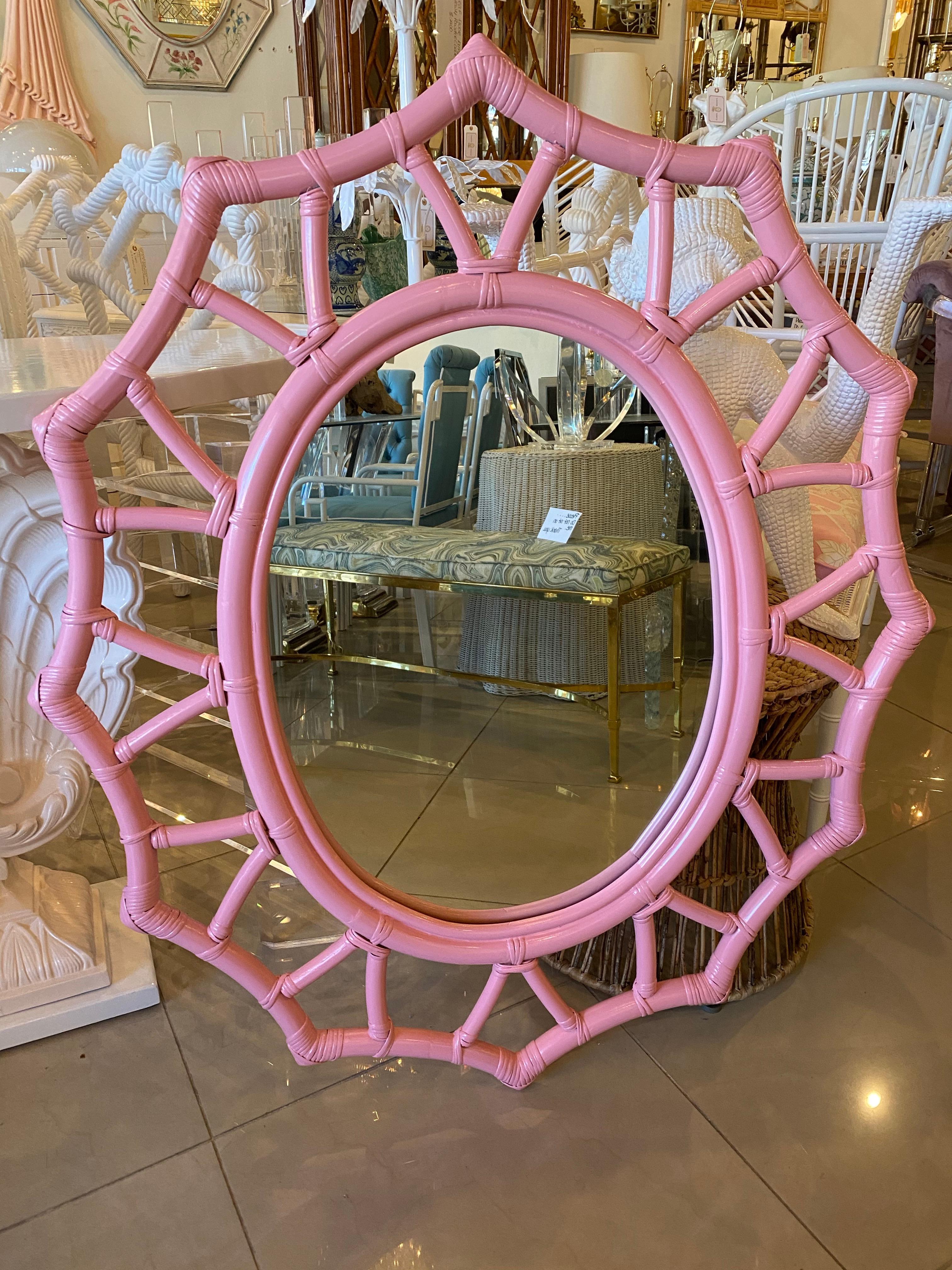Lovely vintage rattan coral lacquered mirror. New mirror was put in. Ready to hang.