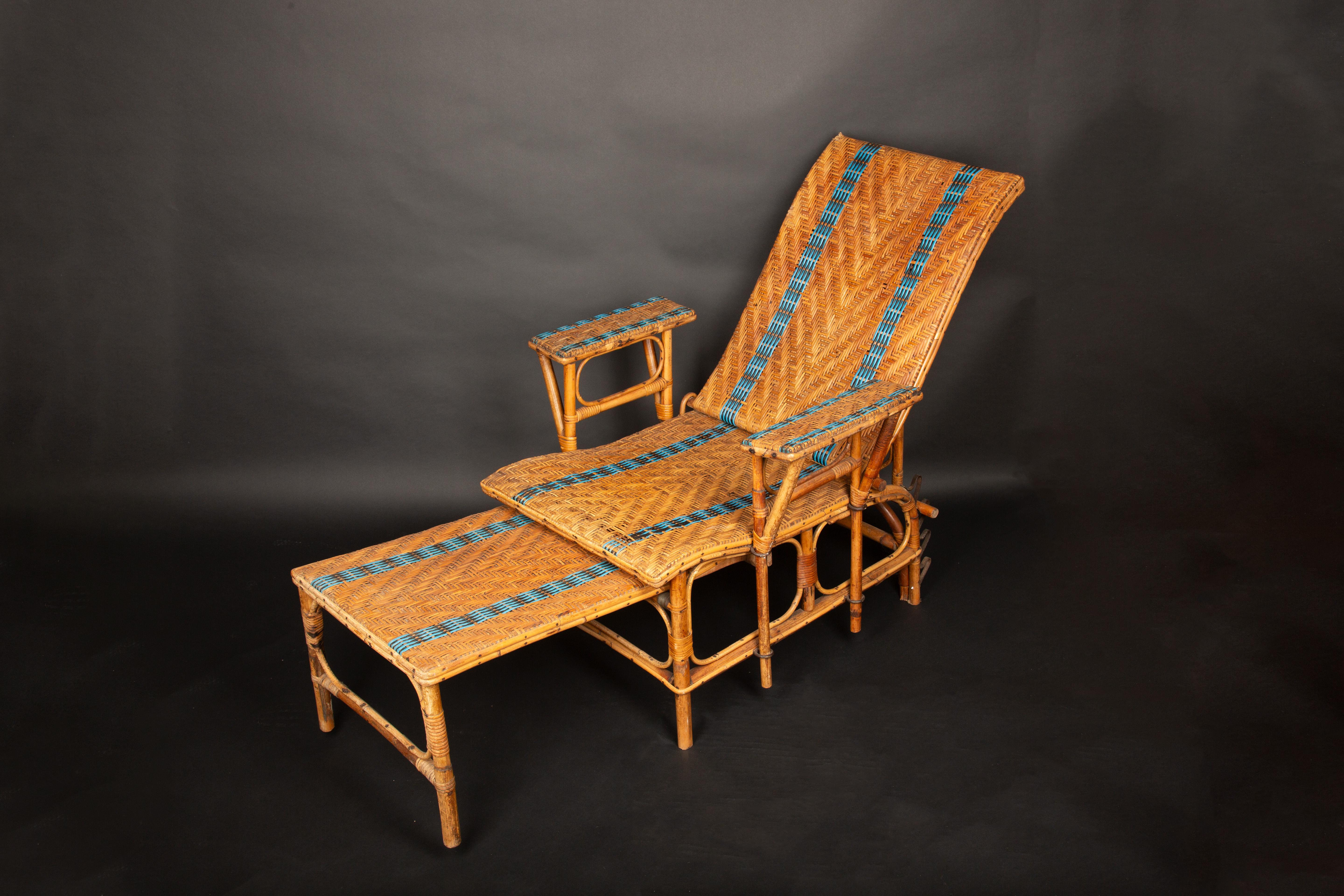 This charming vintage rattan chaise offers both comfort and style, perfect for a relaxed outdoor or indoor setting. The chaise features a fully adjustable reclining back, allowing you to customize your lounging experience from upright to a fully
