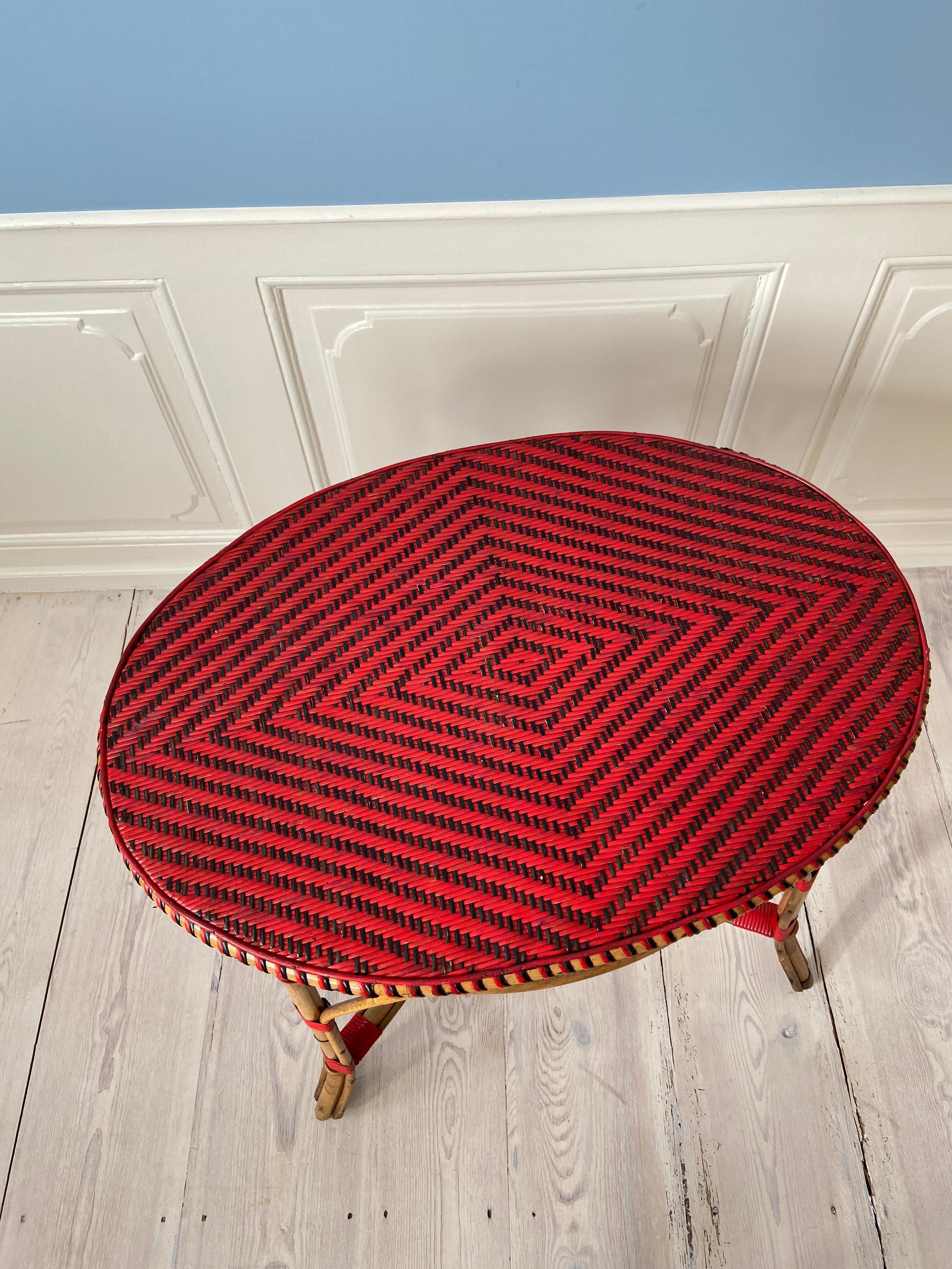Vintage Rattan Table with Elegant Red Woven Details, France, Early 20th-Century 1