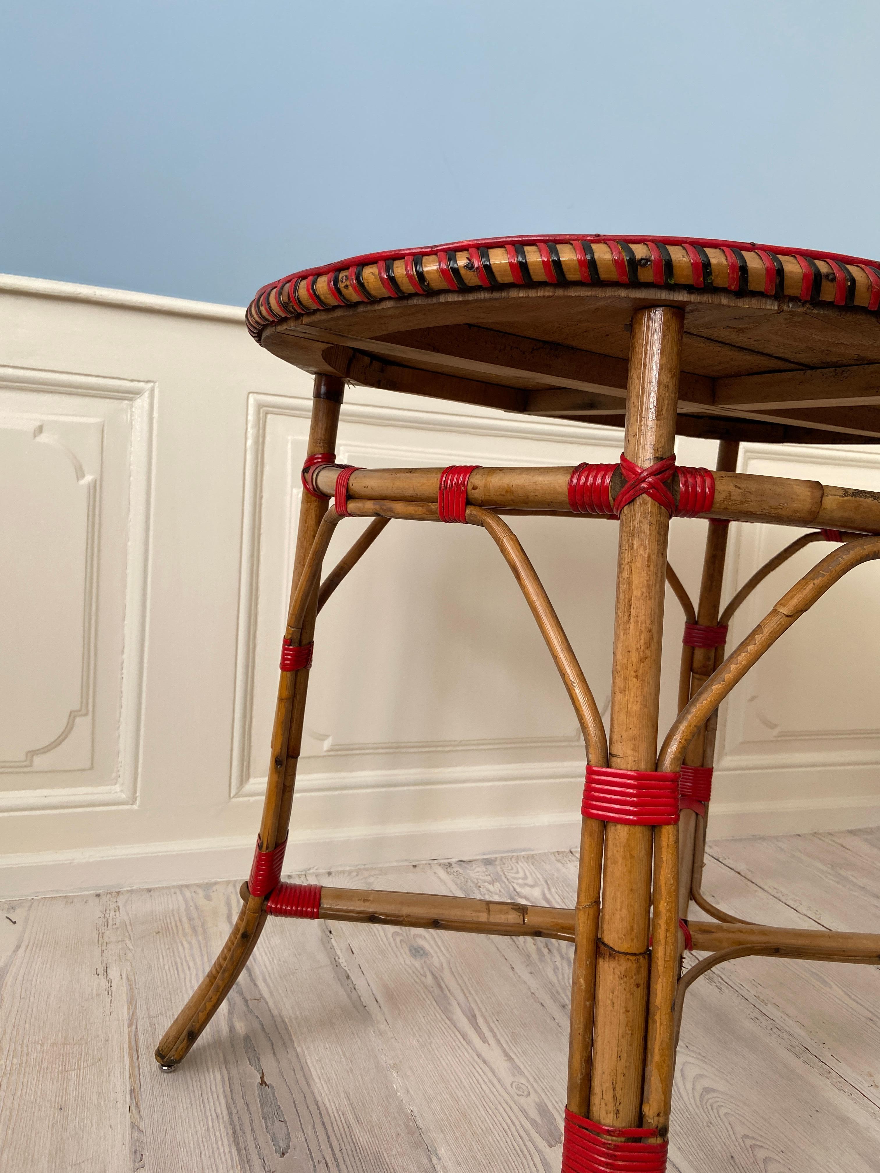 Vintage Rattan Table with Elegant Red Woven Details, France, Early 20th-Century 2