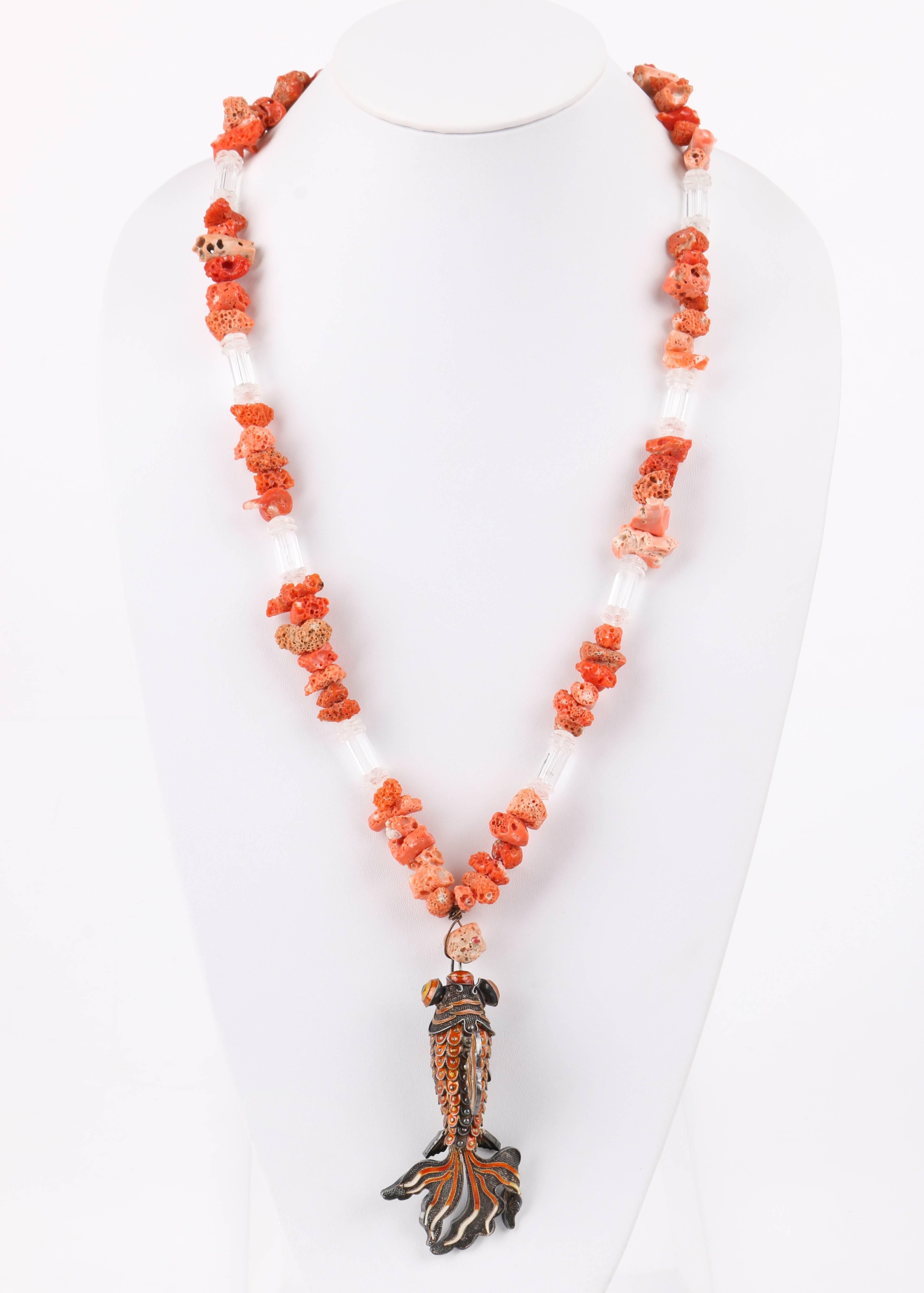 Vintage raw coral and clear beaded articulated cloisonne enamel koi fish pendant necklace. Silver-toned sculptural metal Chinese koi fish pendant with articulated body, eyes, and fins. Cloisonne enamel detail along scales, fins, face, and eyes in