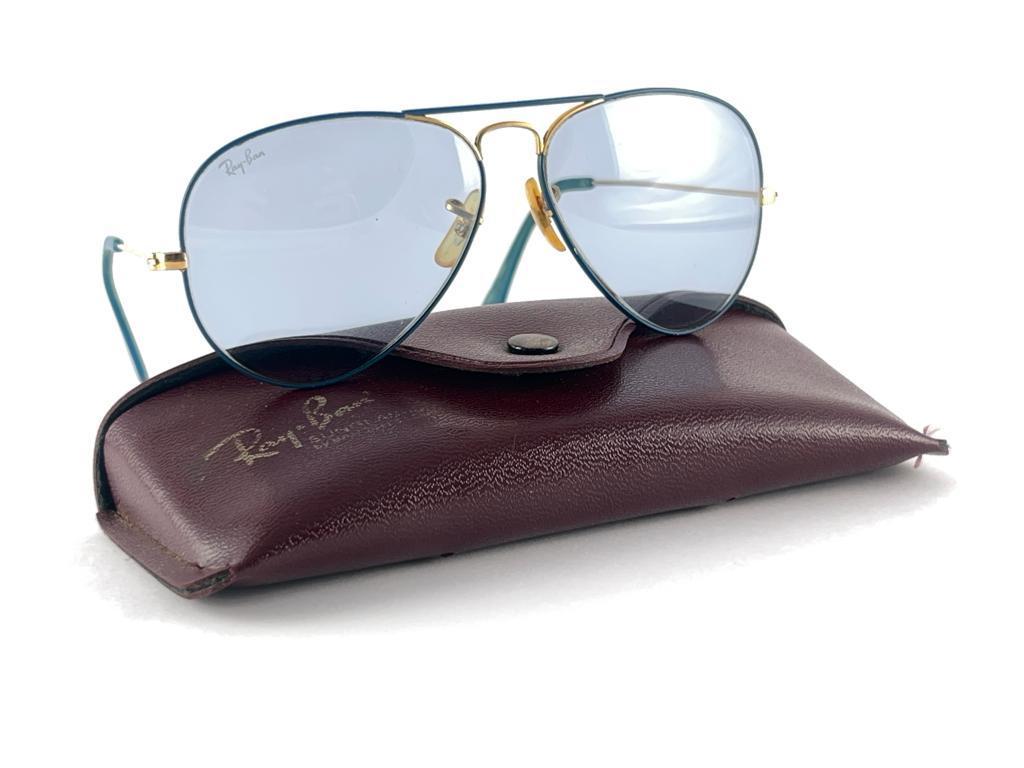 Vintage Ray Ban Flying Colors Series in cobalt with blue changeable lenses. B&L etched in both lenses. Comes with its original Ray Ban B&L case. 
Please notice this pair show visible sign of wear on the frame  and lenses due to nearly 40 years of