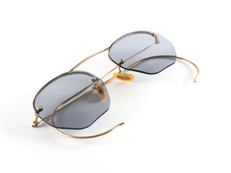 Women's or Men's Vintage Ray Ban Rimless 12 K Gold Medium Grey Lenses 1960's B&L Sunglasses For Sale