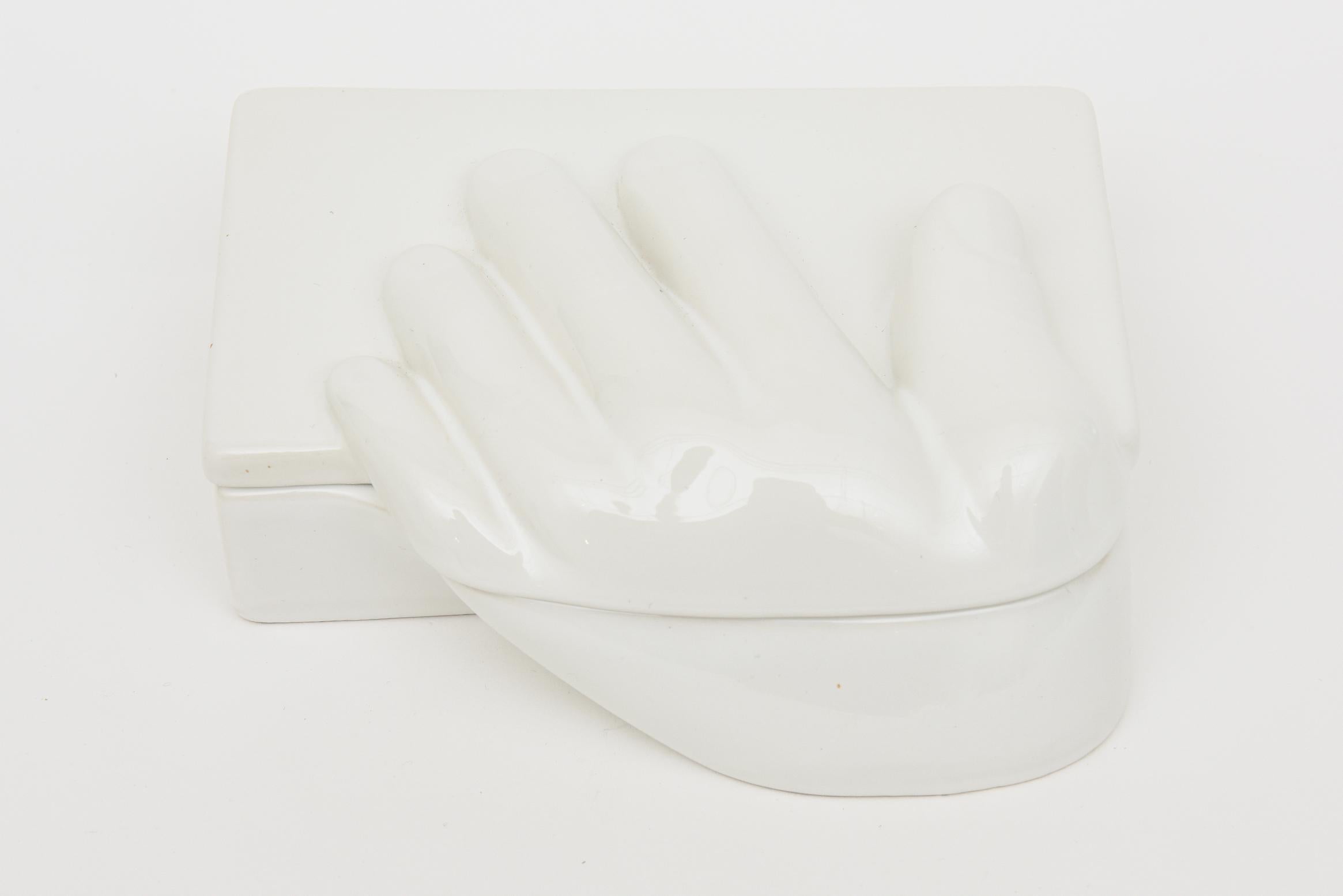 This vintage hallmarked white ceramic 2 part box has a formed hand as part of the box. it is an  obscure rare box and marked on the bottom Raymor Mancer Made In Italy with a Raymor sticker. It is fun, great for a woman or a man and makes a great