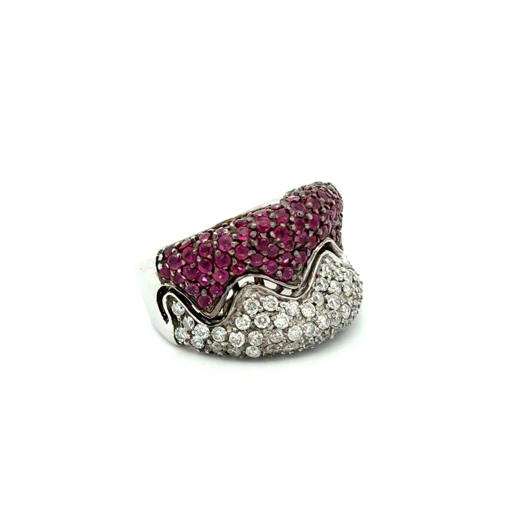 Simply Beautiful! Ruby and Diamond Gold Opposites Ring. Hand set with 2.00tcw Rubies, and 1.50tcw Round Brilliant Cut Diamonds. Hand crafted 18K White Gold mounting. Ring size 6.75, we offer ring resizing. In excellent condition, recently