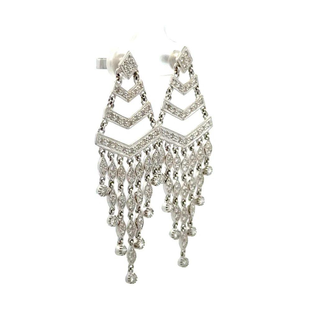 Simply Stunning! Vintage Diamond Gold Drop Chandelier Earrings. Securely Hand set with Round Brilliant Cut Diamonds, weighing approx. 1.40tcw. Beautifully Hand crafted in 18K White Gold. Measuring approx. 2.1” long. In excellent condition, recently
