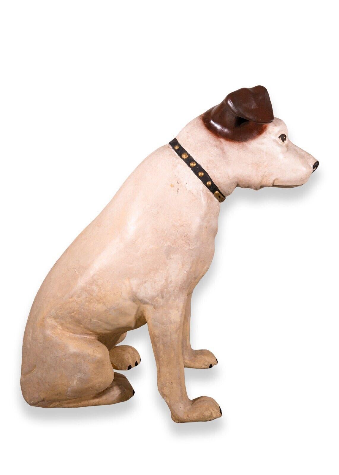 A vintage RCA Nipper the dog store display sculpture. A super cool collectable store display. This piece is Nipper the Dog, a advertising icon from RCA Records. The dog's origin comes from RCA's original brand in Victor Talking Machine Co. They used