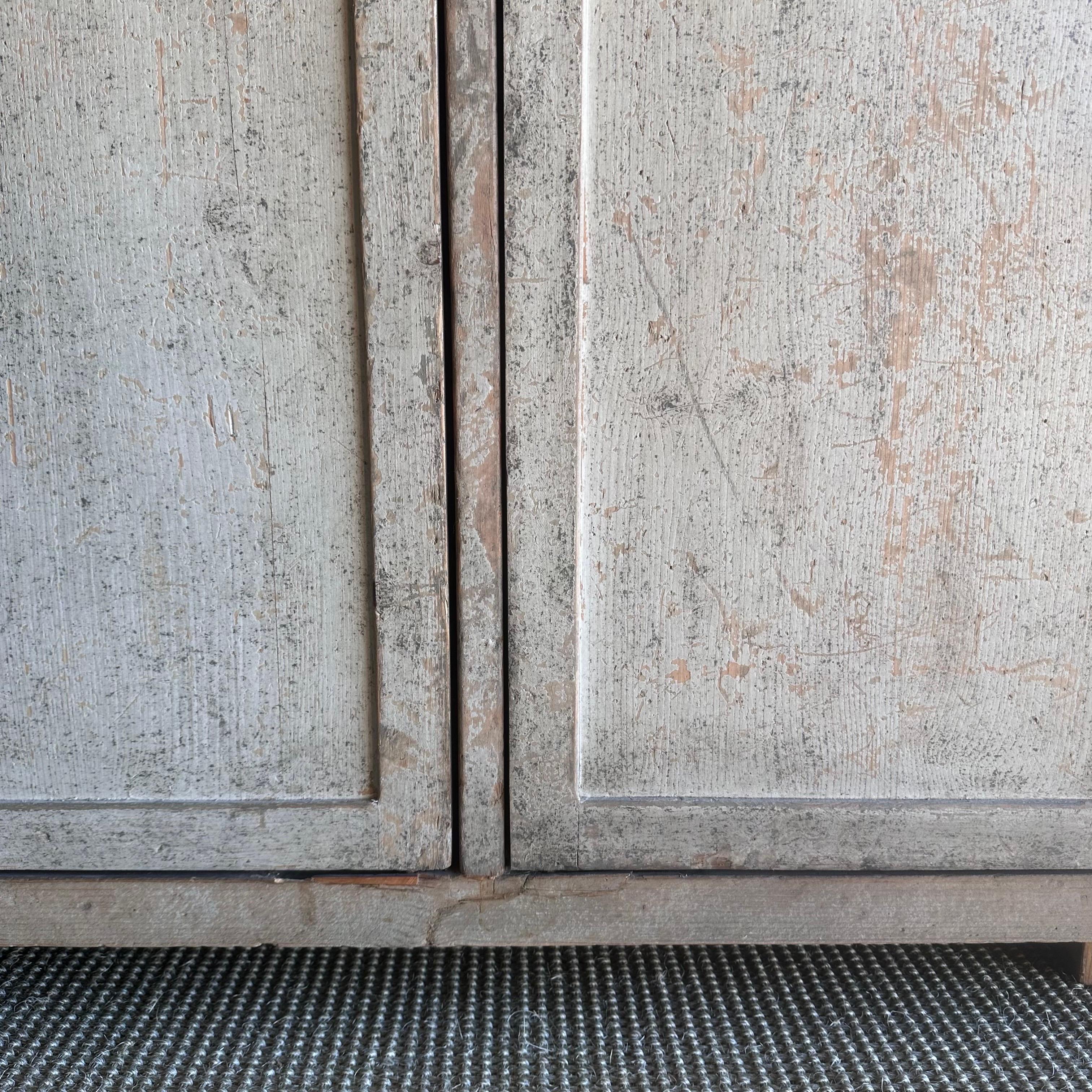 Vintage Reclaimed Cabinet in a Gray Natural Patina Painted Finish For Sale 6