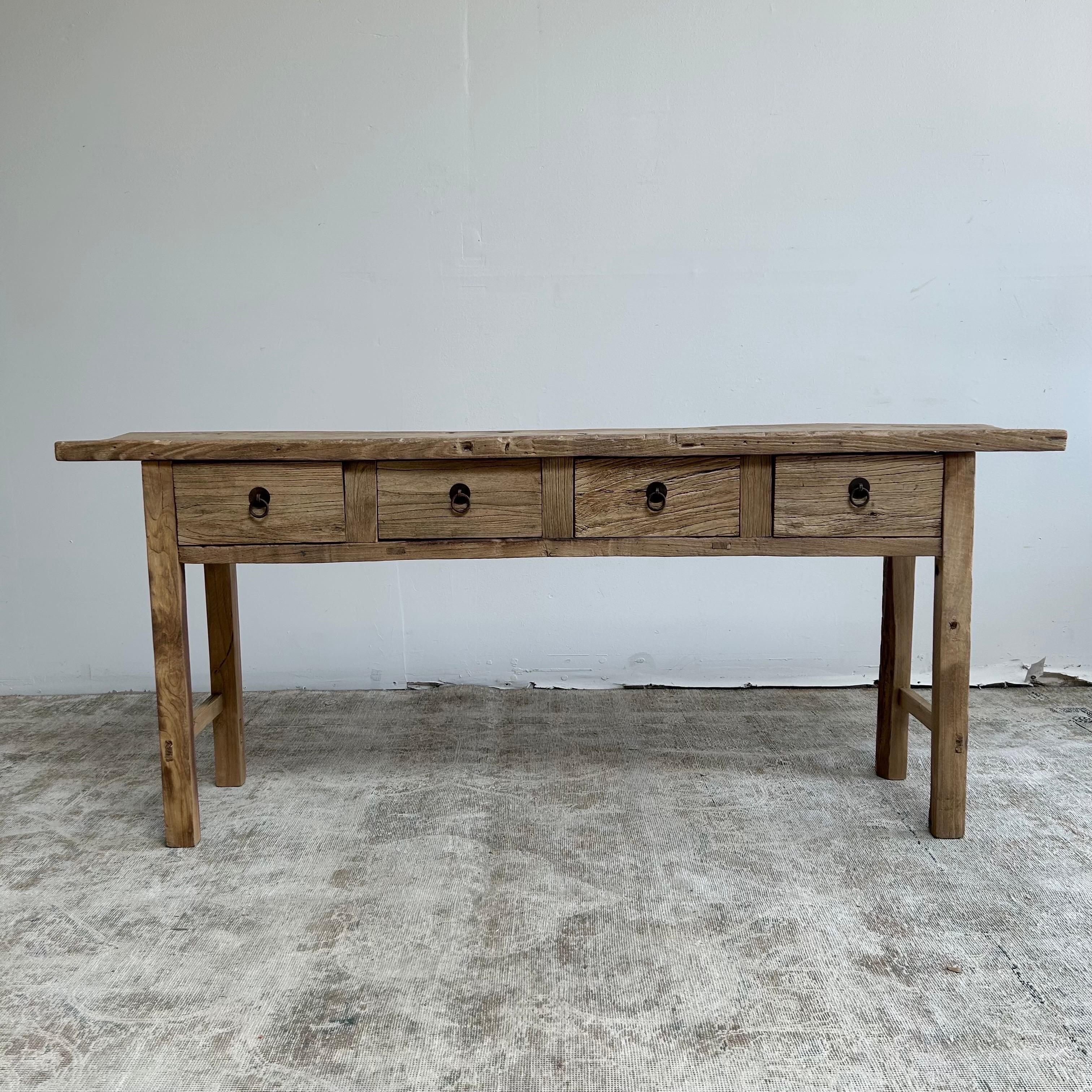 Vintage Reclaimed elm wood 4-drawer console table. 
Natural distressed patina. Drawers open and close with ease.
Measures: 74”W x 15”D x 32”H.
Solid / Sturdy, great for everyday use in an entry, living room, use for a sofa table or dining room