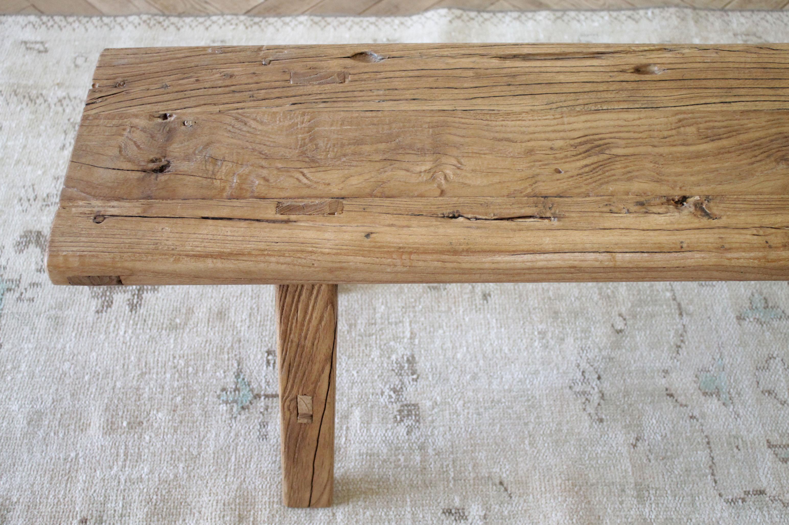 Vintage reclaimed natural elm wood bench with wide seat and beautiful patina, great for end of the bed, living room or dining room. Made from old reclaimed elmwood timbers.
Measures: 63