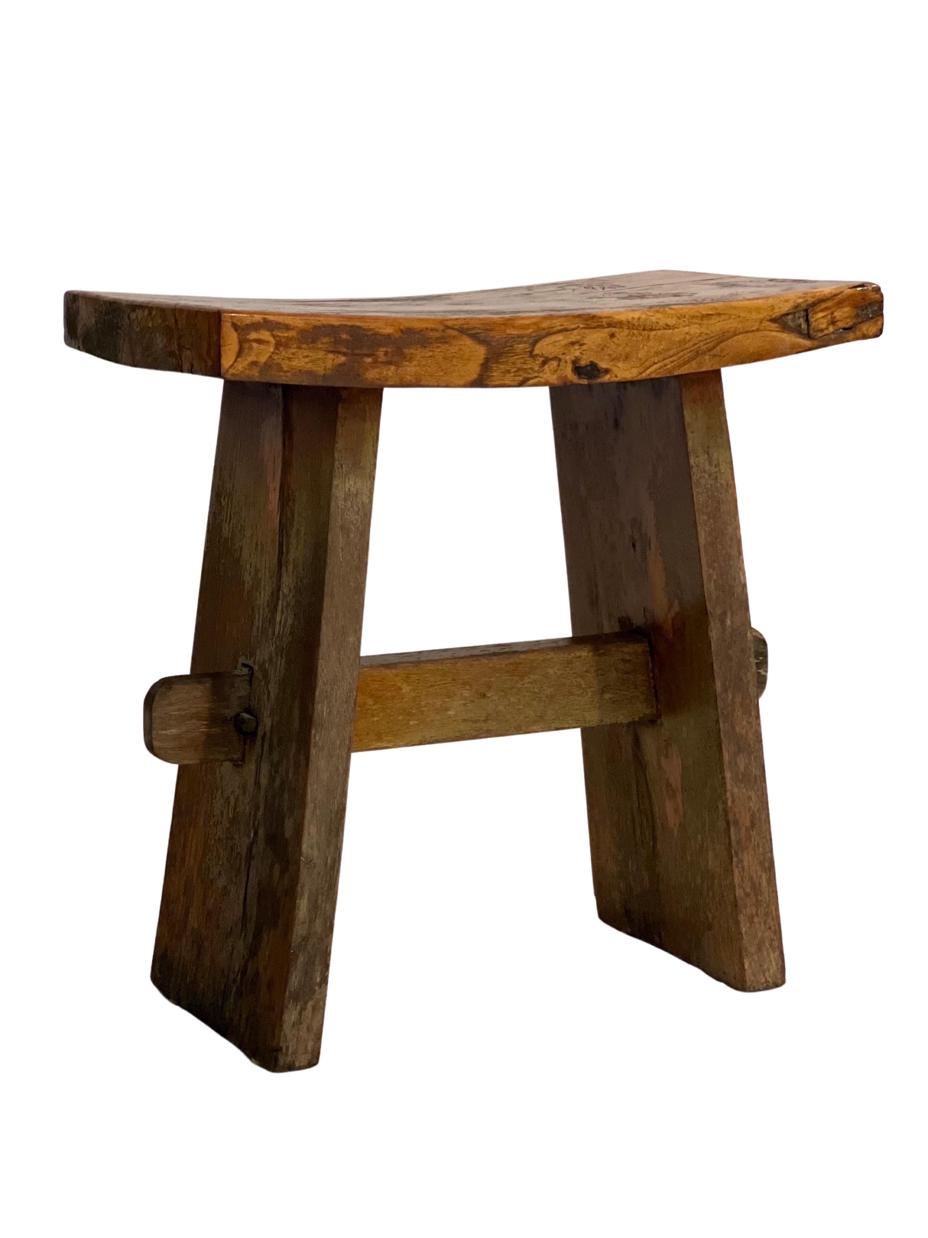 Vintage reclaimed teak rustic zen temple or garden stool, China, circa 1940's.

This adorable stool is crafted of heavy reclaimed teak from a fishing boat. It features original Chinese wood peg construction and has a great time-worn patina. The